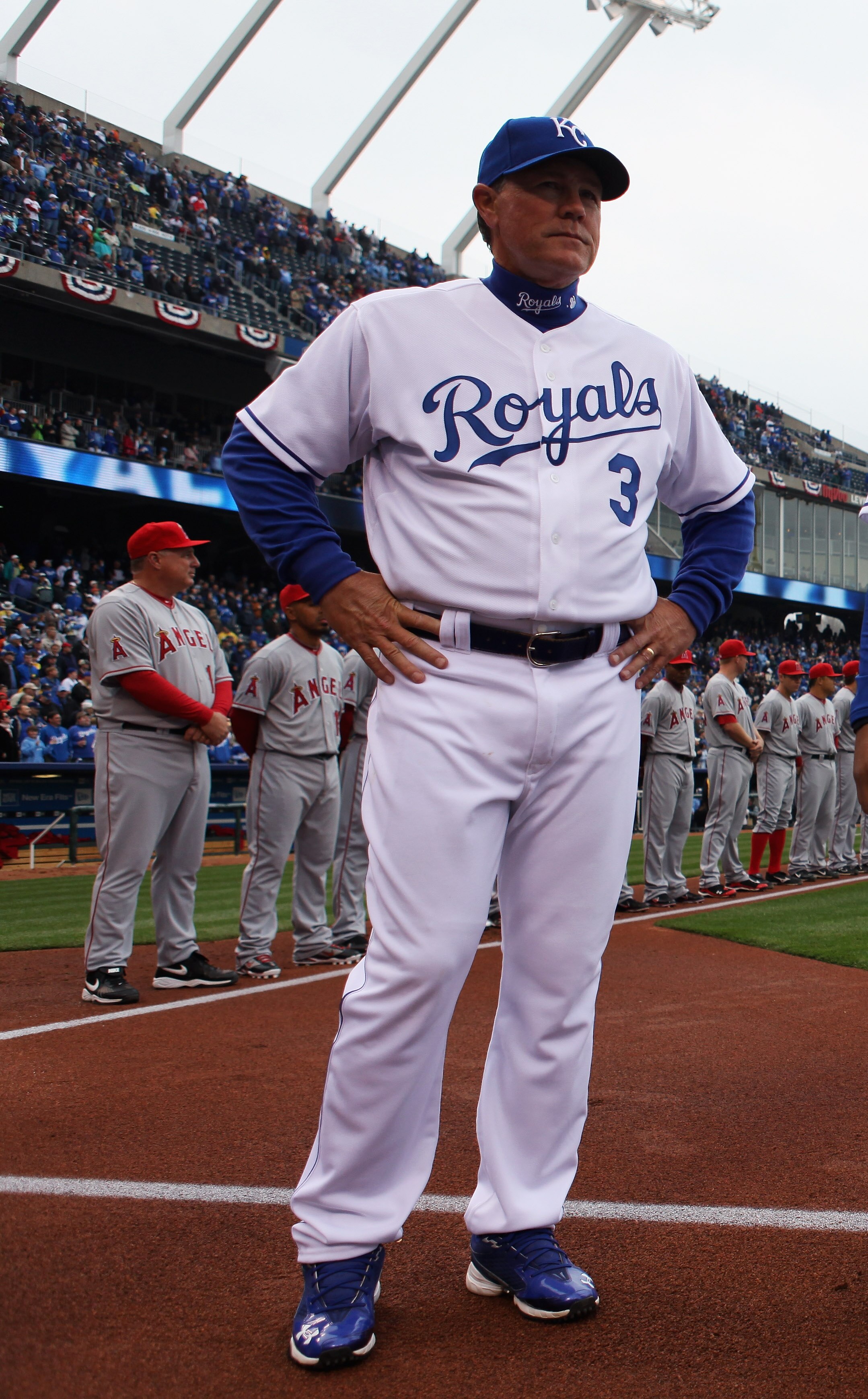 KANSAS CITY, MO - MARCH 31: Manager Ned Yost #3 of the Kansas City Royals watches during player introductions prior to the start of the opening day game against the Los Angeles Angels of Anaheim at Kauffman Stadium on March 31, 2011 in Kansas City, Misso KANSAS CITY, MO - MARCH 31: Manager Ned Yost #3 of the Kansas City Royals watches during player introductions prior to the start of the opening day game against the Los Angeles Angels of Anaheim at Kauffman Stadium on March 31, 2011 in Kansas City, Misso