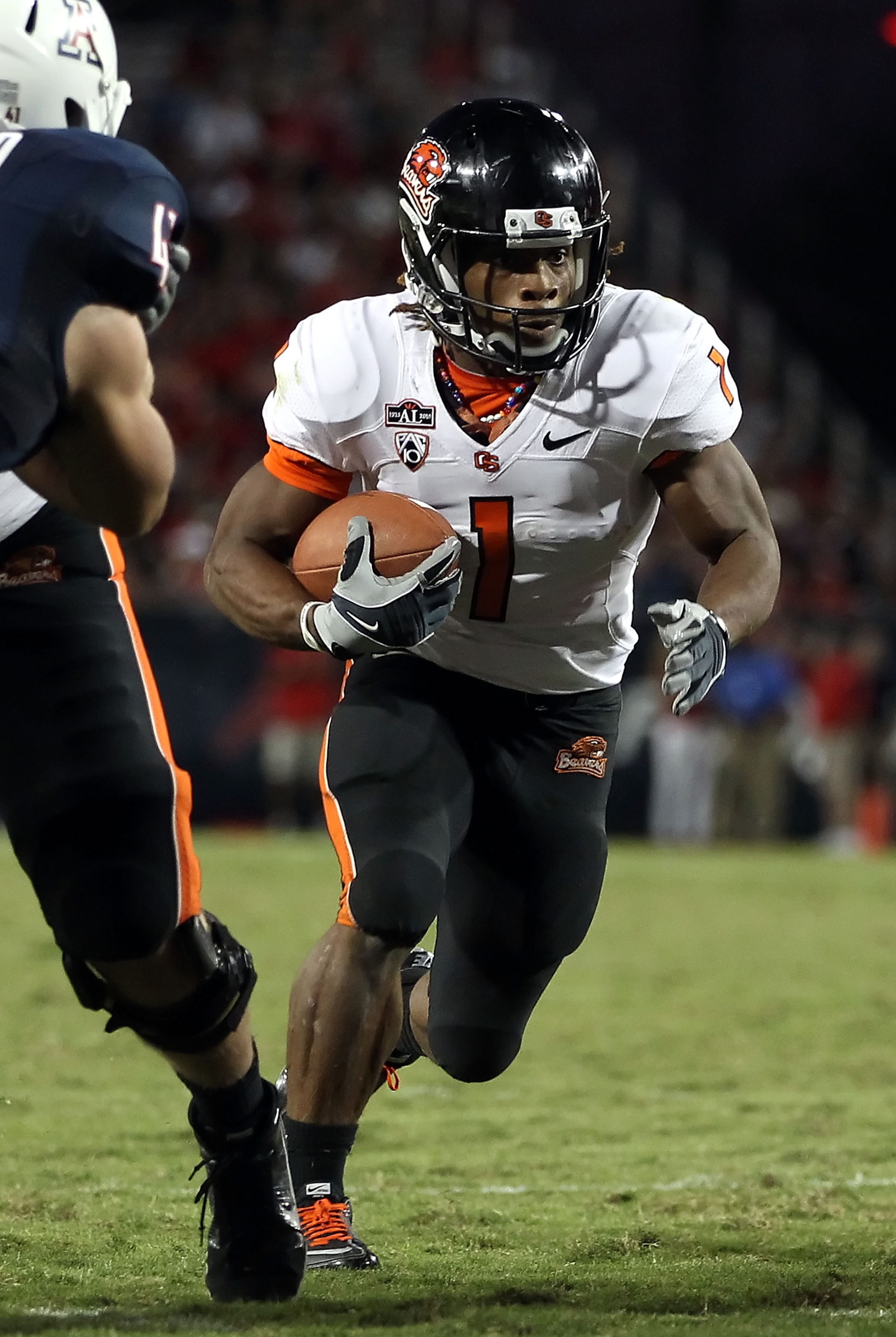 TUCSON, AZ - OCTOBER 09: Runningback Jacquizz Rodgers #1 of the Oregon State Beavers runs with the football during the college football game against the Arizona Wildcats at Arizona Stadium on October 9, 2010 in Tucson, Arizona. The Beavers defeated the W TUCSON, AZ - OCTOBER 09: Runningback Jacquizz Rodgers #1 of the Oregon State Beavers runs with the football during the college football game against the Arizona Wildcats at Arizona Stadium on October 9, 2010 in Tucson, Arizona. The Beavers defeated the W