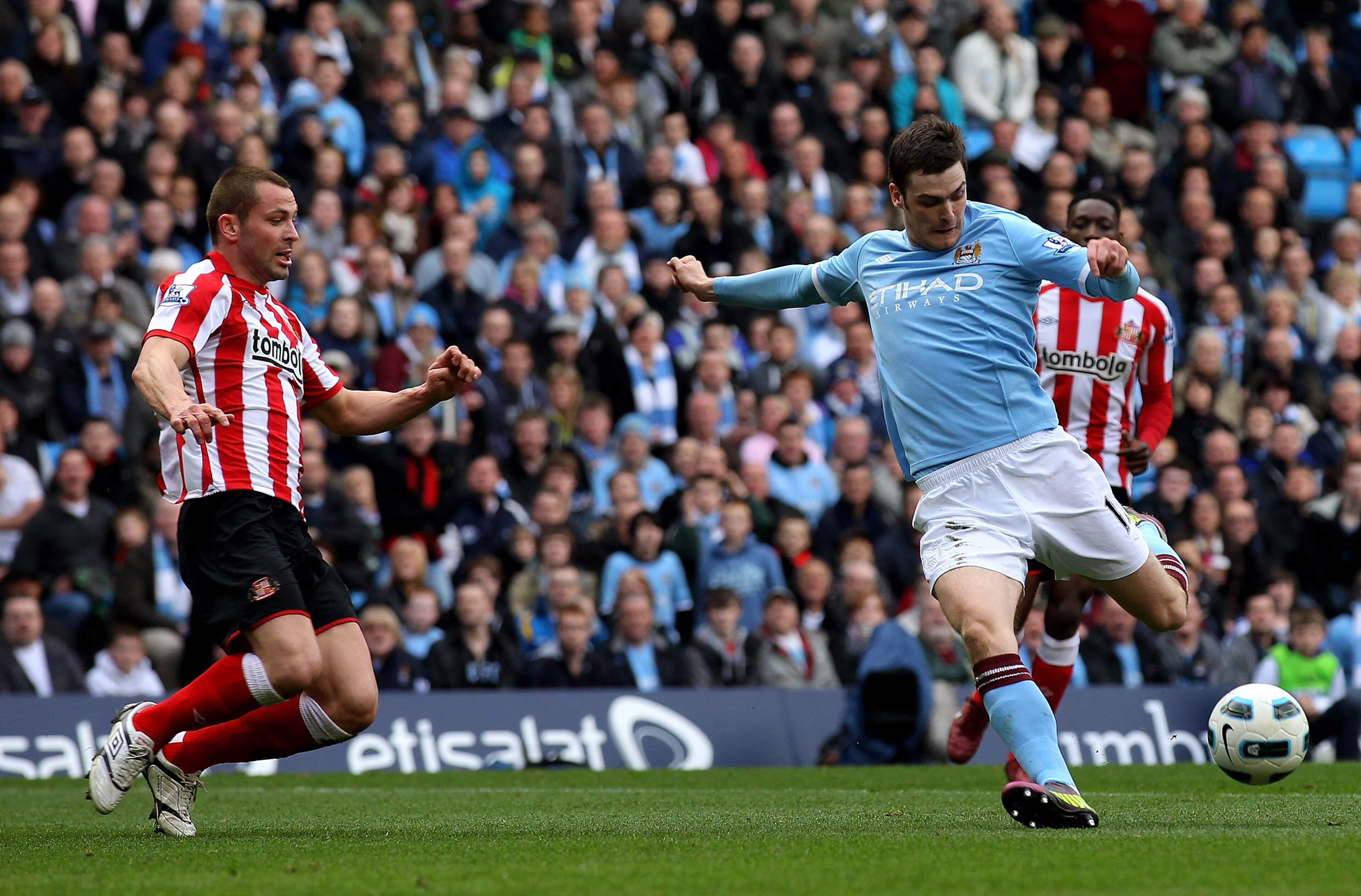 MANCHESTER, ENGLAND - APRIL 03: Adam Johnson of Manchester City scores the opening goal during the Barclays Premier League match between Manchester City and Sunderland at the City of Manchester Stadium on April 3, 2011 in Manchester, England. (Photo by MANCHESTER, ENGLAND - APRIL 03: Adam Johnson of Manchester City scores the opening goal during the Barclays Premier League match between Manchester City and Sunderland at the City of Manchester Stadium on April 3, 2011 in Manchester, England. (Photo by