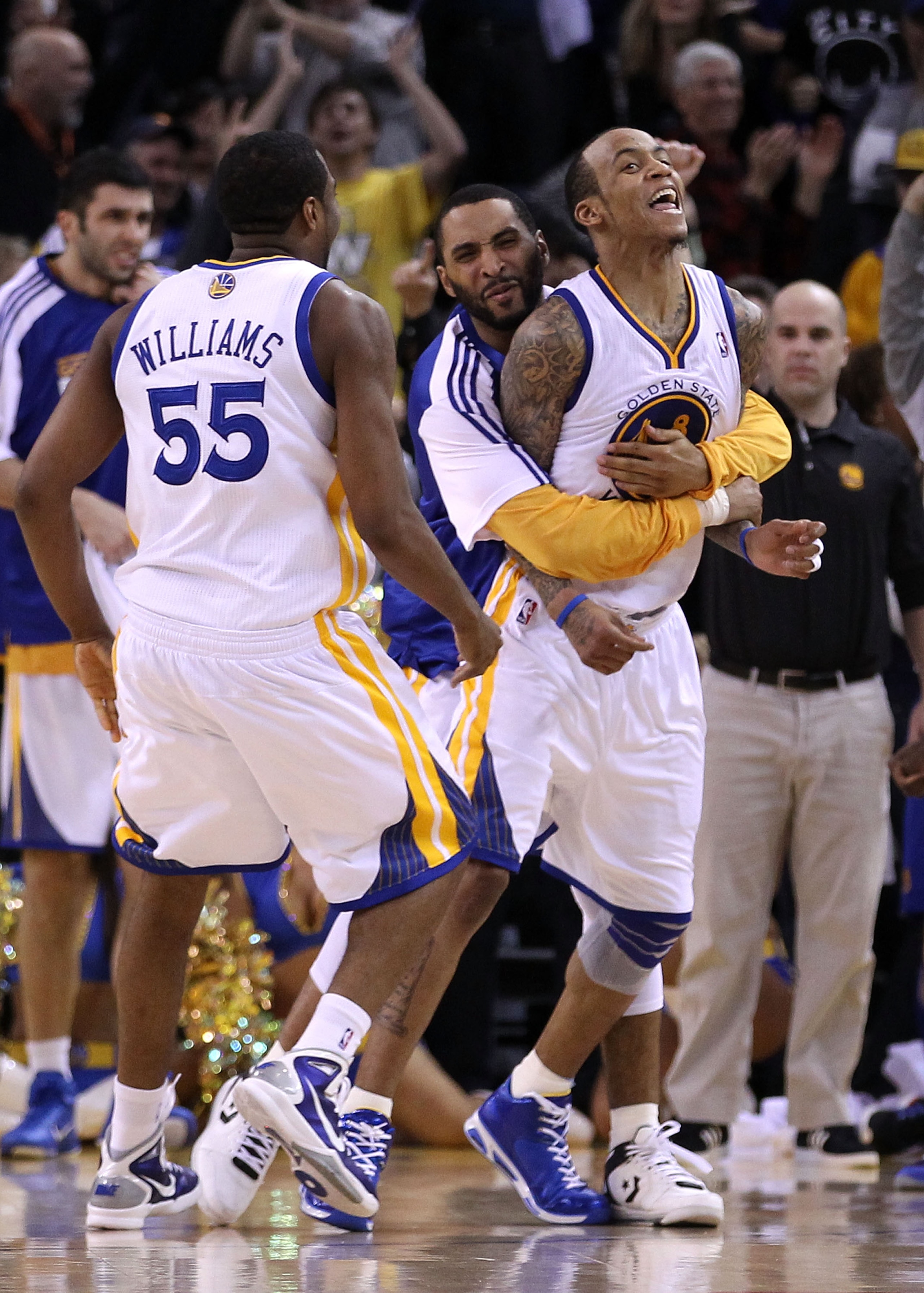 OAKLAND, CA - JANUARY 19:  Monta Ellis #8 of the Golden State Warriors is congratulated by teammates after he made the winning shot with 0.6 seconds left in their game againsts the Indiana Pacers at Oracle Arena on January 19, 2011 in Oakland, California.