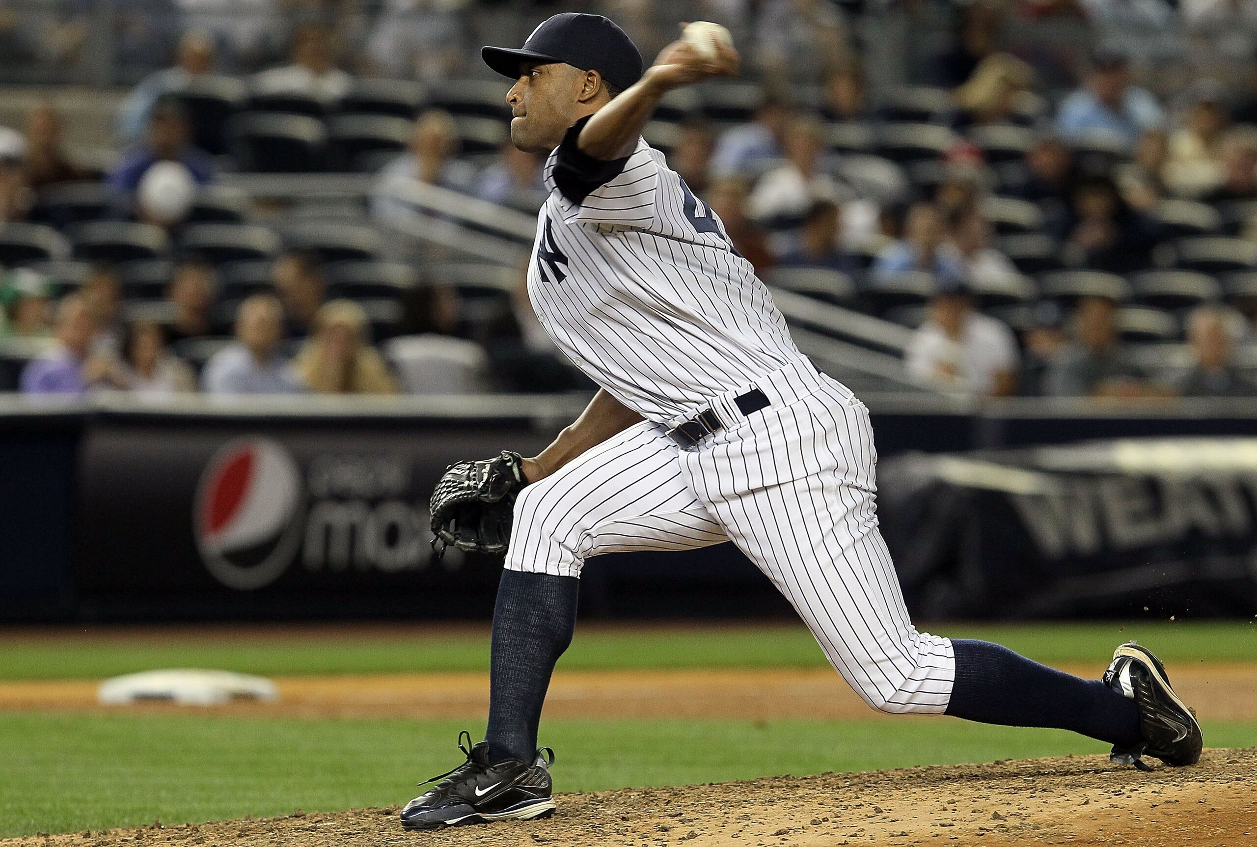 NEW YORK - JUNE 17:  Damaso Marte #43 of the New York Yankees pitches against the Philadelphia Phillies on June 17, 2010 at Yankee Stadium in the Bronx borough of New York City. The Phillies defeated the Yankees 7-1.  (Photo by Jim McIsaac/Getty Images)