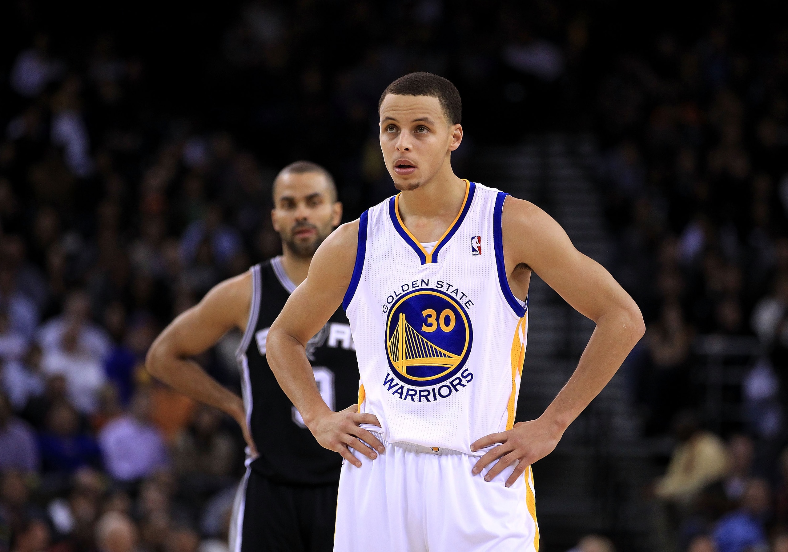 OAKLAND, CA - JANUARY 24:  Stephen Curry #30 of the Golden State Warriors stands at midcourt during their game against the San Antonio Spurs at Oracle Arena on January 24, 2011 in Oakland, California.  NOTE TO USER: User expressly acknowledges and agrees 