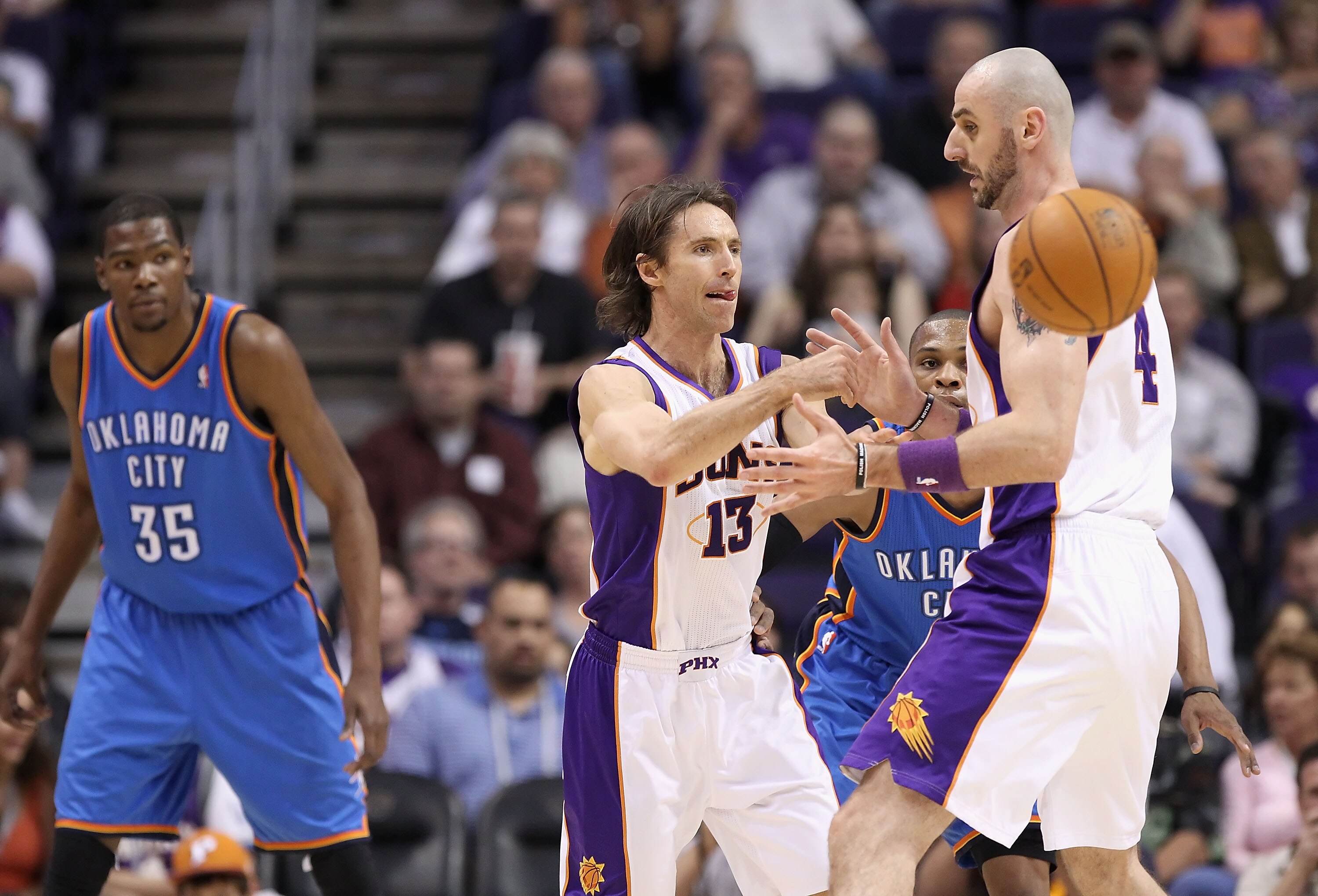 PHOENIX, AZ - MARCH 30:  Steve Nash #13 of the Phoenix Suns handles the ball during the NBA game against the Oklahoma City Thunder at US Airways Center on March 30, 2011 in Phoenix, Arizona.  The Thunder defeated the Suns 116-98. NOTE TO USER: User expres