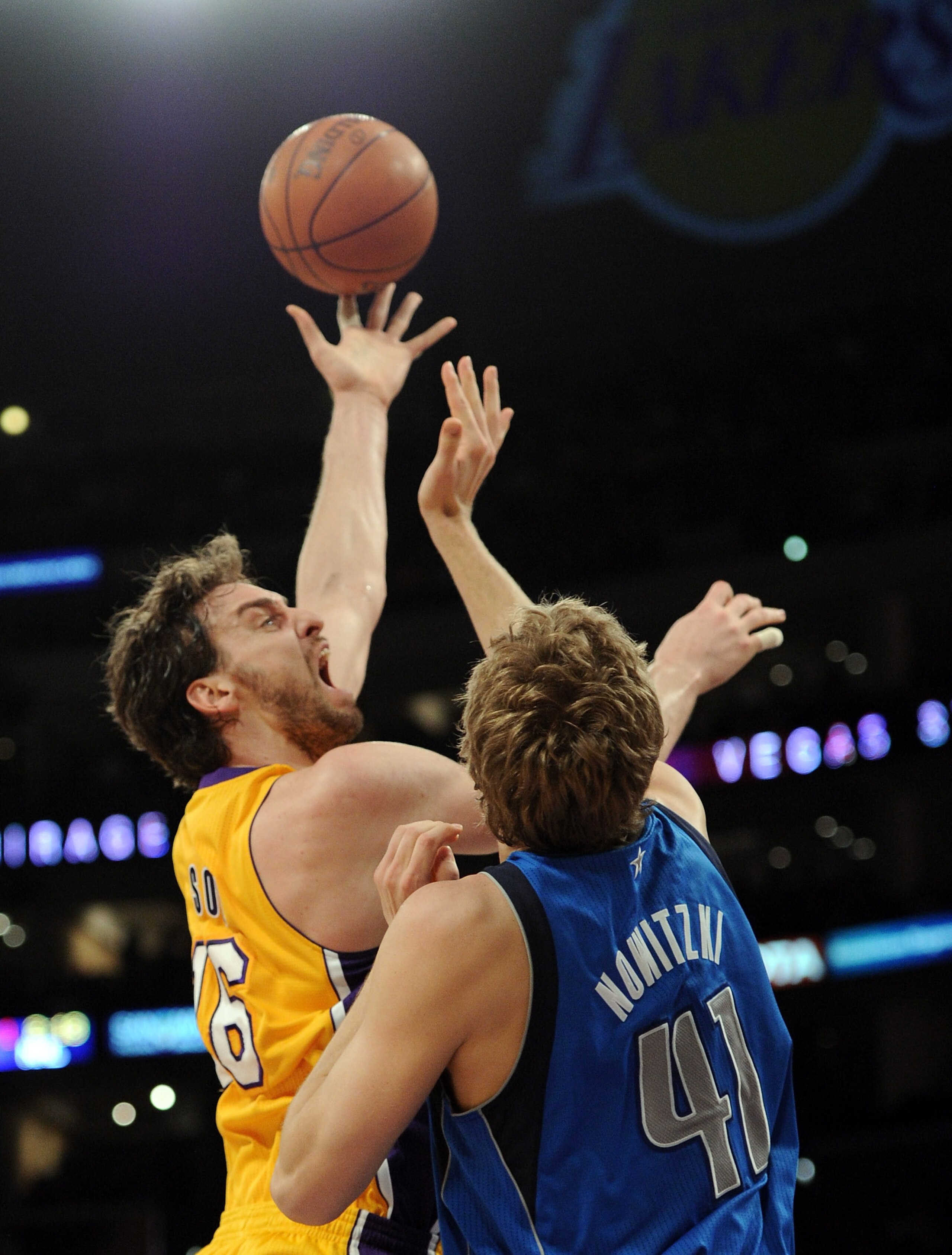 LOS ANGELES, CA - MARCH 31: Pau Gasol #16 of the Los Angeles Lakers shoots a jump hook over Dirk Nowitzki #41 of the Dallas Mavericks at Staples Center on March 31, 2011 in Los Angeles, California. NOTE TO USER: User expressly acknowledges and agrees th LOS ANGELES, CA - MARCH 31: Pau Gasol #16 of the Los Angeles Lakers shoots a jump hook over Dirk Nowitzki #41 of the Dallas Mavericks at Staples Center on March 31, 2011 in Los Angeles, California. NOTE TO USER: User expressly acknowledges and agrees th
