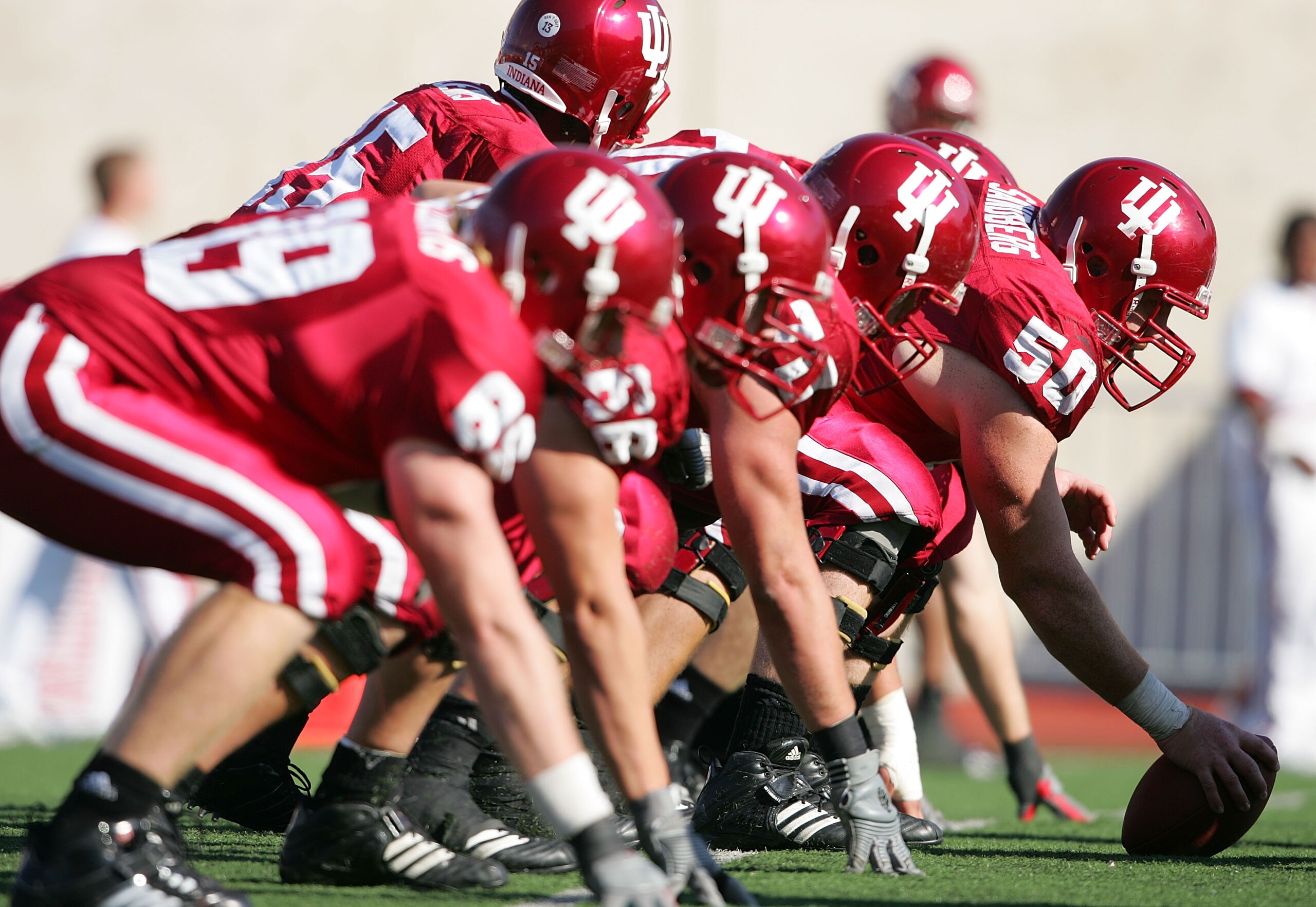 BLOOMINGTON, IN - NOVEMBER 3:  The Indiana Hoosiers offensive unit is pictured at the line of scrimmage against the Ball State Cardinals during the game at Memorial Stadium November 3, 2007 in Bloomington, Indiana.  (Photo by Andy Lyons/Getty Images)