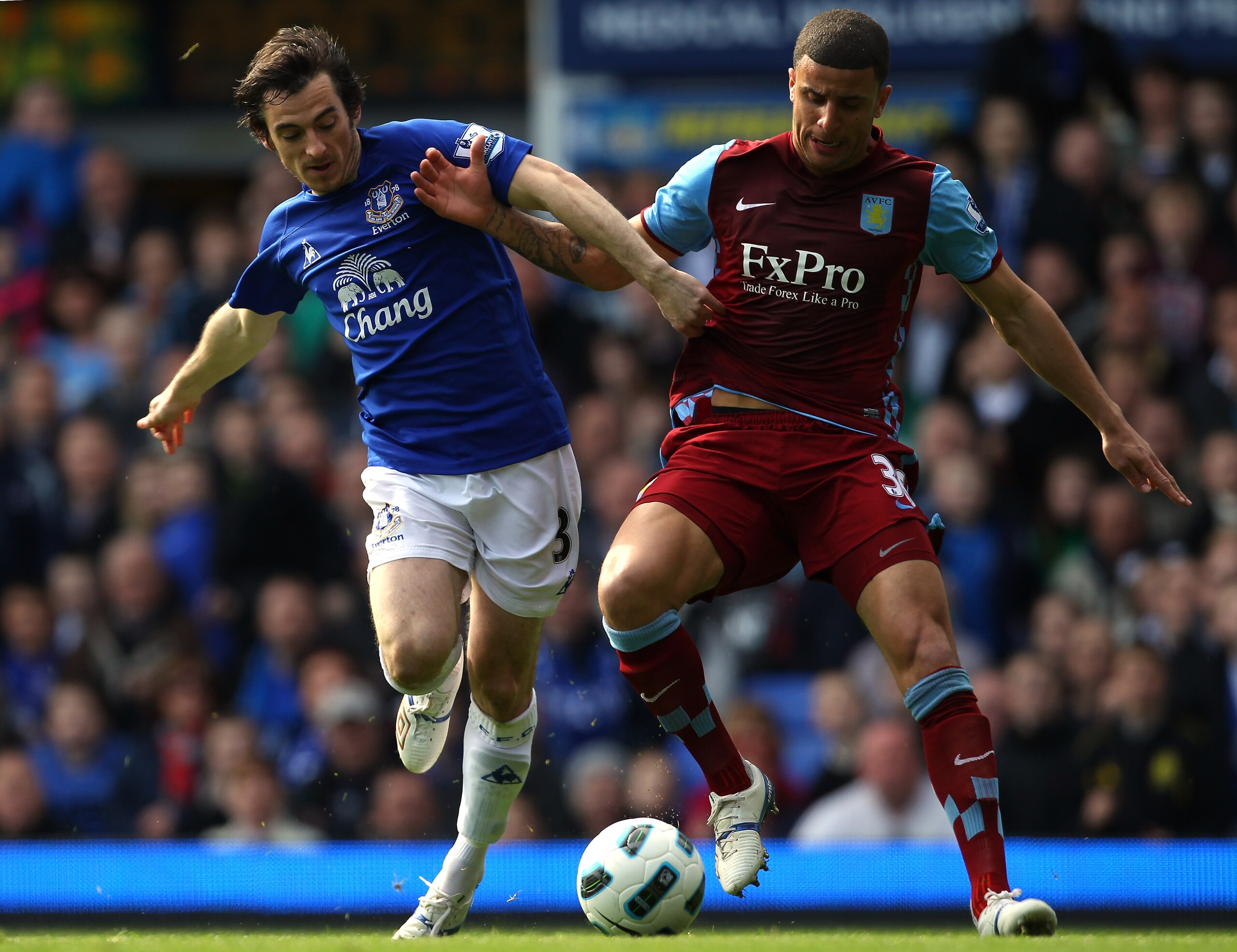 LIVERPOOL, ENGLAND - APRIL 02:  Leighton Baines of Everton challenges Kyle Walker of Aston Villa for the ball during the Barclays Premier League match between Everton and Aston Villa at Goodison Park on April 2, 2011 in Liverpool, England.  (Photo by Alex