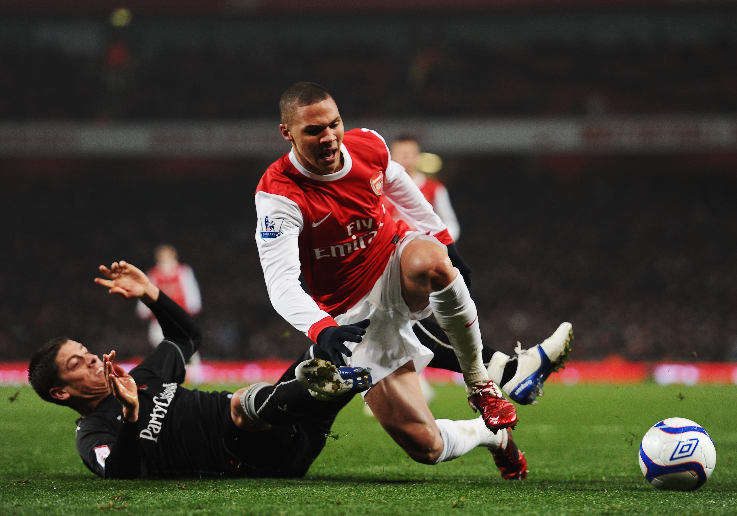LONDON, UNITED KINGDOM - MARCH 02:  Alex Revell (L) of Leyton Orient tackles Kieran Gibbs (R) of Arsenal and concedes a penalty during the FA Cup sponsored by E.ON 5th Round Replay match between between Arsenal and Leyton Orient at the Emirates Stadium on