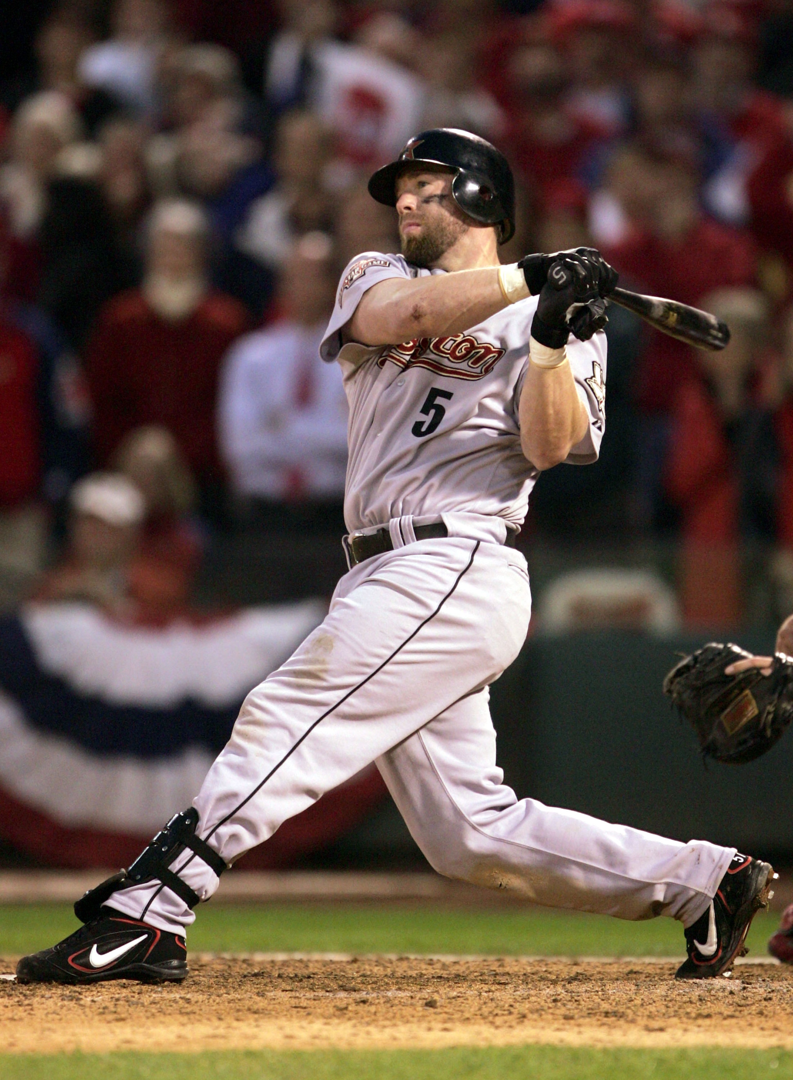 ST. LOUIS - OCTOBER 20:  Jeff Bagwell #5 of the Houston Astros hits a single to bring in the game-tying run in the ninth inning of Game 6 of the National League Championship Series against the St. Louis Cardinals during the 2004 Major League Baseball Play