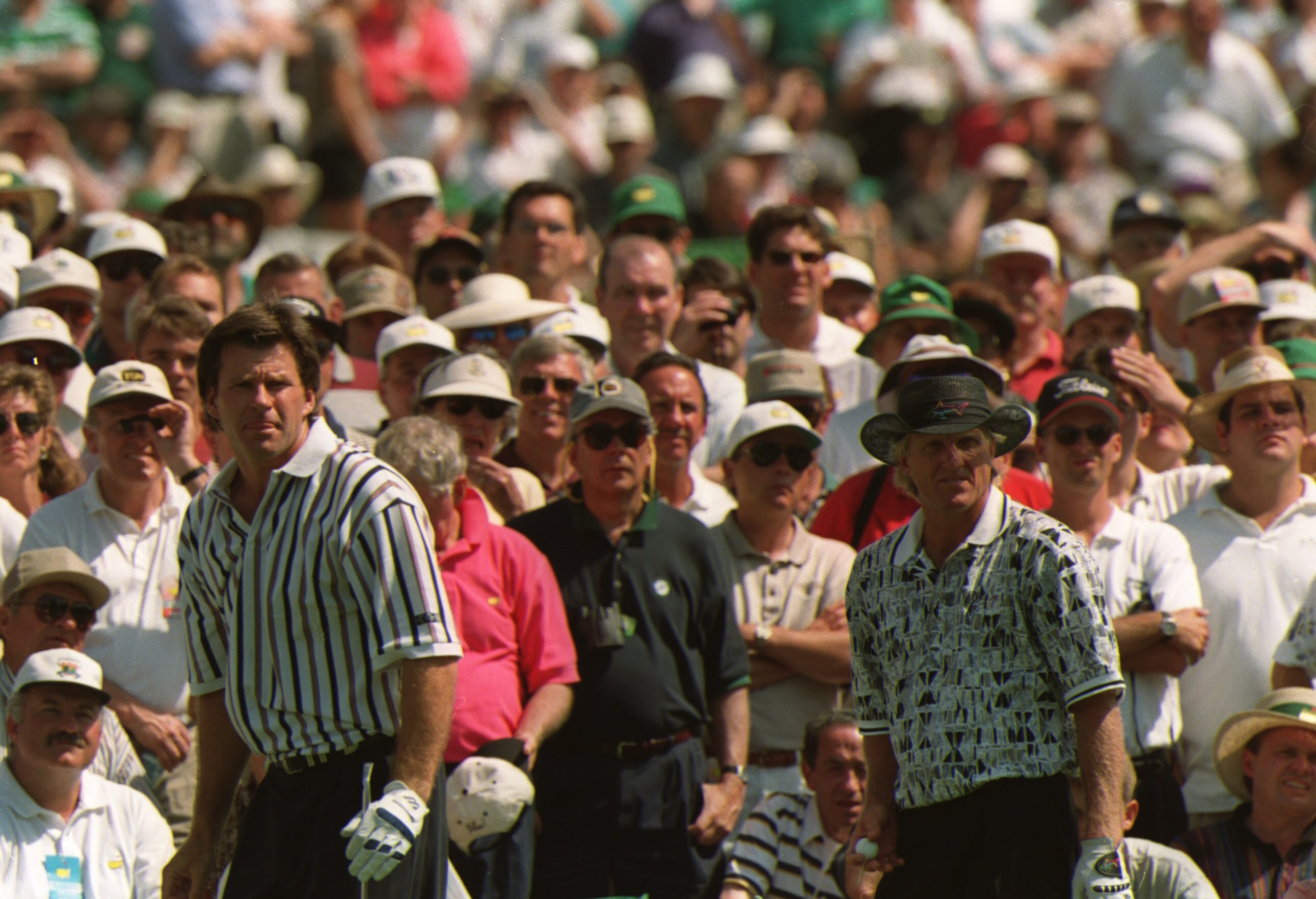 14 Apr 1996 :  Nick Faldo of England and greg Norman of Australia on the third tee during the final tound of the 1996 US Masters Golf Championship at the Augusta National Golf Club in Augusta, Georgia. Faldo went on to win the event from Greg Norman. Mand