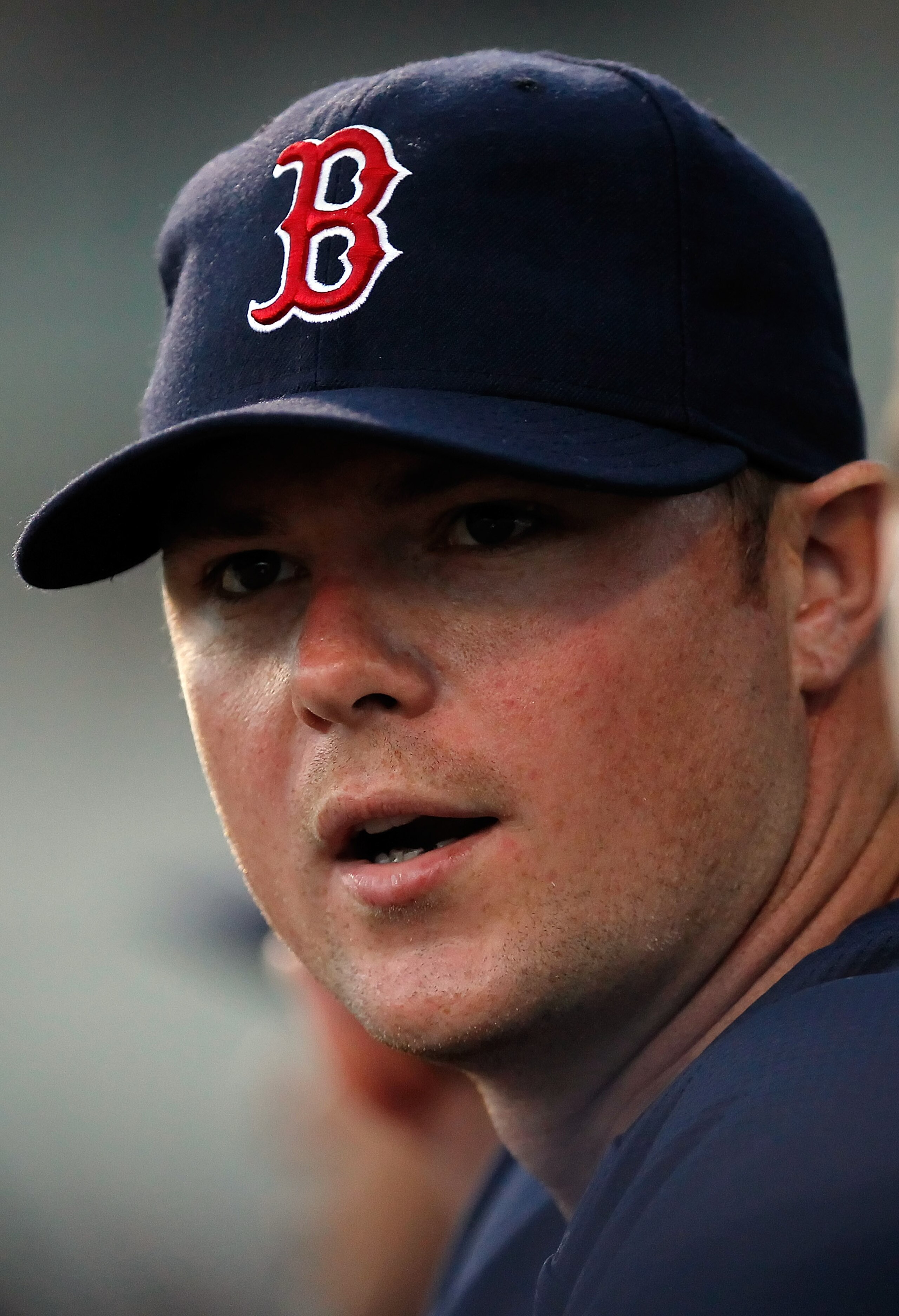 FORT MYERS, FL - MARCH 14:  Pitcher Jon Lester #31 of the Boston Red Sox watches his team from the dugout against the New York Yankees during a Grapefruit League Spring Training Game at City of Palms Park on March 14, 2011 in Fort Myers, Florida.  (Photo
