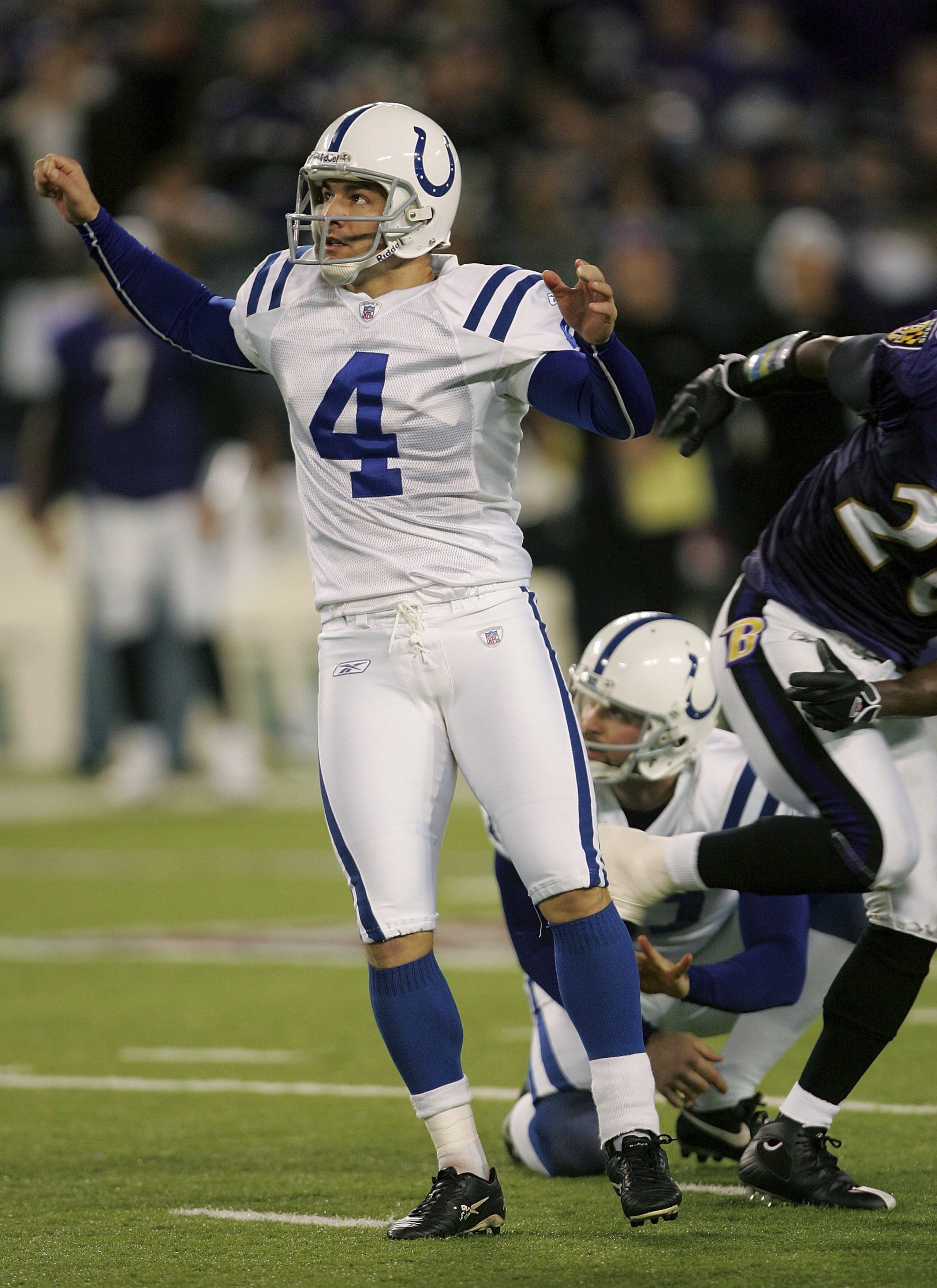 BALTIMORE - JANUARY 13: Adam Vinatieri #4 of the Indianapolis Colts watches watches a field goal as Hunter Smith #17 holds for him during their AFC Divisional Playoff game against the Baltiomre Ravens on January 13, 2007 at M&T Bank Stadium in Baltimore, BALTIMORE - JANUARY 13: Adam Vinatieri #4 of the Indianapolis Colts watches watches a field goal as Hunter Smith #17 holds for him during their AFC Divisional Playoff game against the Baltiomre Ravens on January 13, 2007 at M&T Bank Stadium in Baltimore,