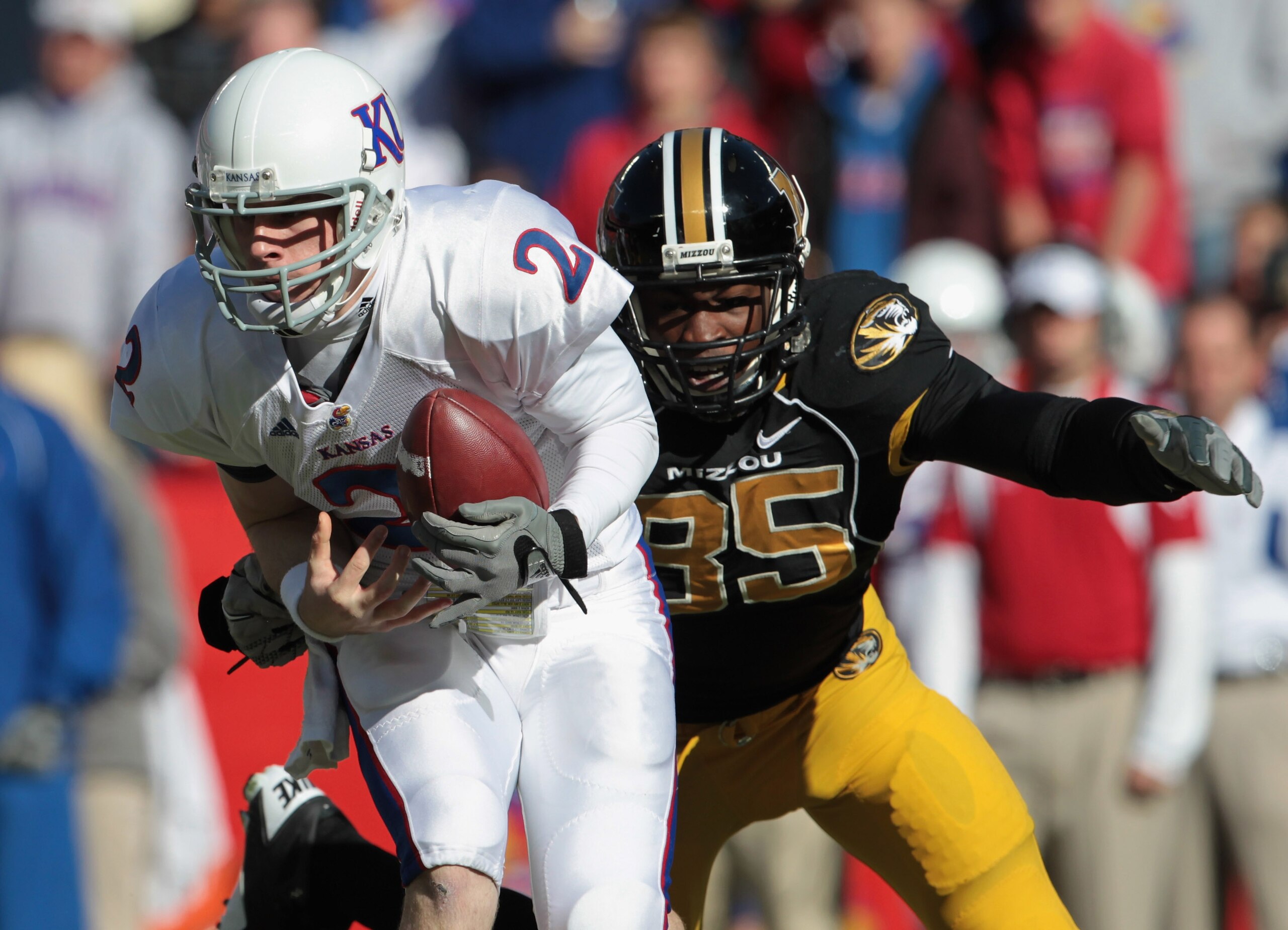 KANSAS CITY, MO - NOVEMBER 27: Quarterback Jordan Webb #2 of the Kansas Jayhawks is sacked by Aldon Smith #85 of the Missouri Tigers during the game on November 27, 2010 at Arrowhead Stadium in Kansas City, Missouri. (Photo by Jamie Squire/Getty Images) KANSAS CITY, MO - NOVEMBER 27: Quarterback Jordan Webb #2 of the Kansas Jayhawks is sacked by Aldon Smith #85 of the Missouri Tigers during the game on November 27, 2010 at Arrowhead Stadium in Kansas City, Missouri. (Photo by Jamie Squire/Getty Images)