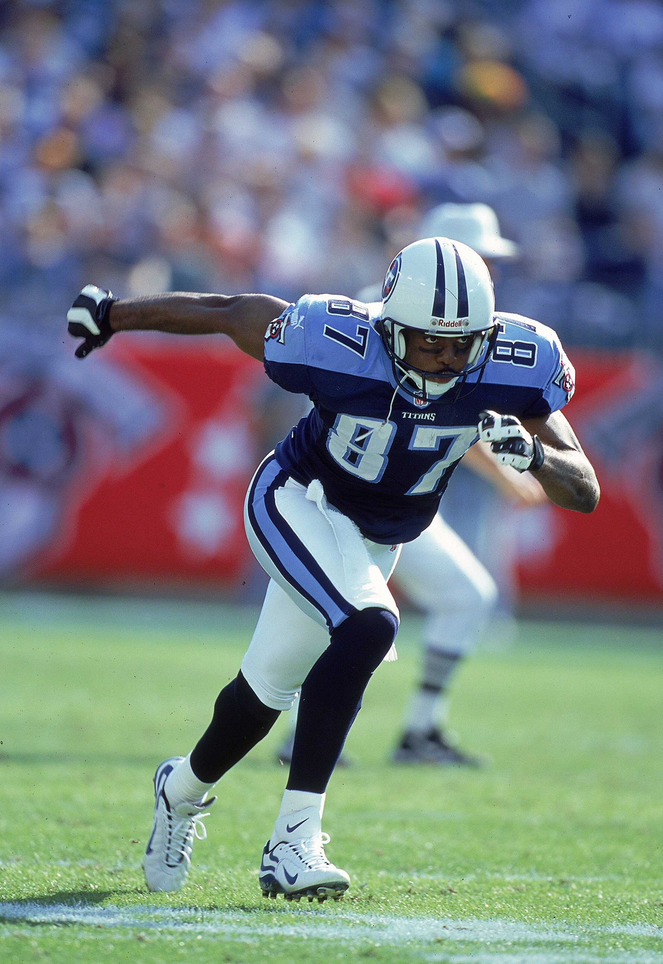 31 Oct 1999: Kevin Dyson #87 of the Nashville Titans runs down the field during a game against the St. Louis Rams at the Adelphia Coliseum in Nashville, Tennessee. The Titans defeated the Rams 24-21. Mandatory Credit: Scott Halleran  /Allsport