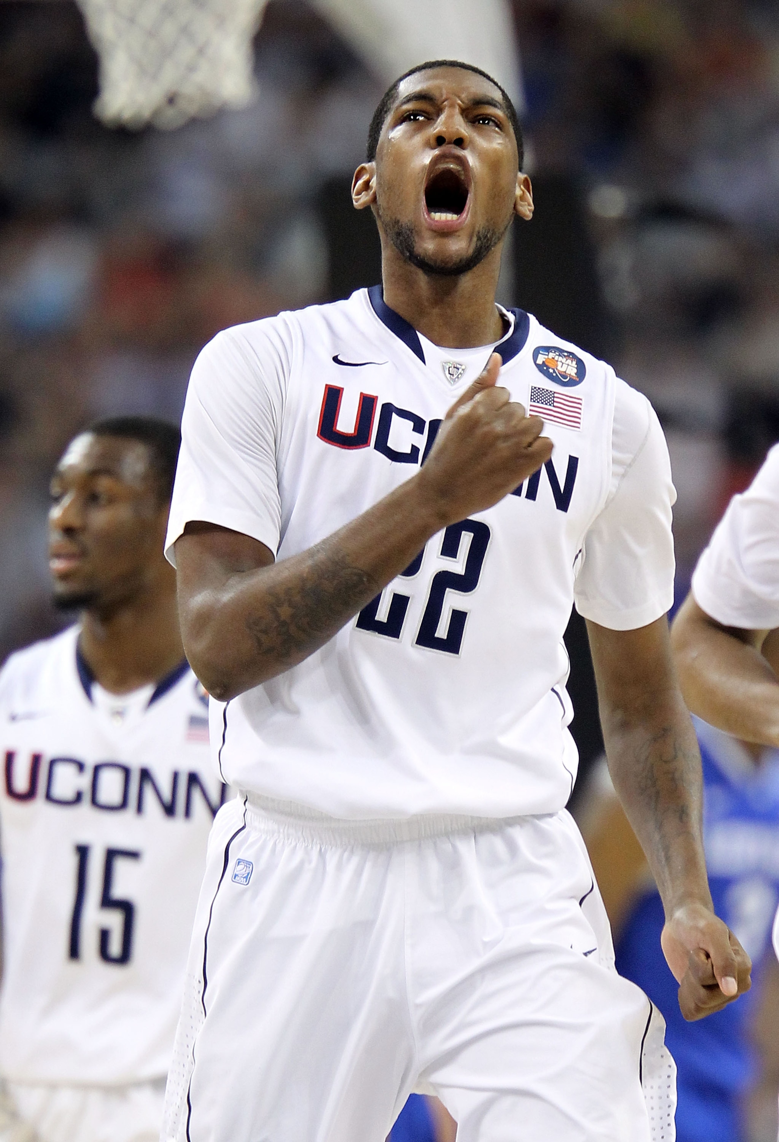 HOUSTON, TX - APRIL 02:  Roscoe Smith #22 of the Connecticut Huskies reacts after a play against the Kentucky Wildcats during the National Semifinal game of the 2011 NCAA Division I Men's Basketball Championship at Reliant Stadium on April 2, 2011 in Hous