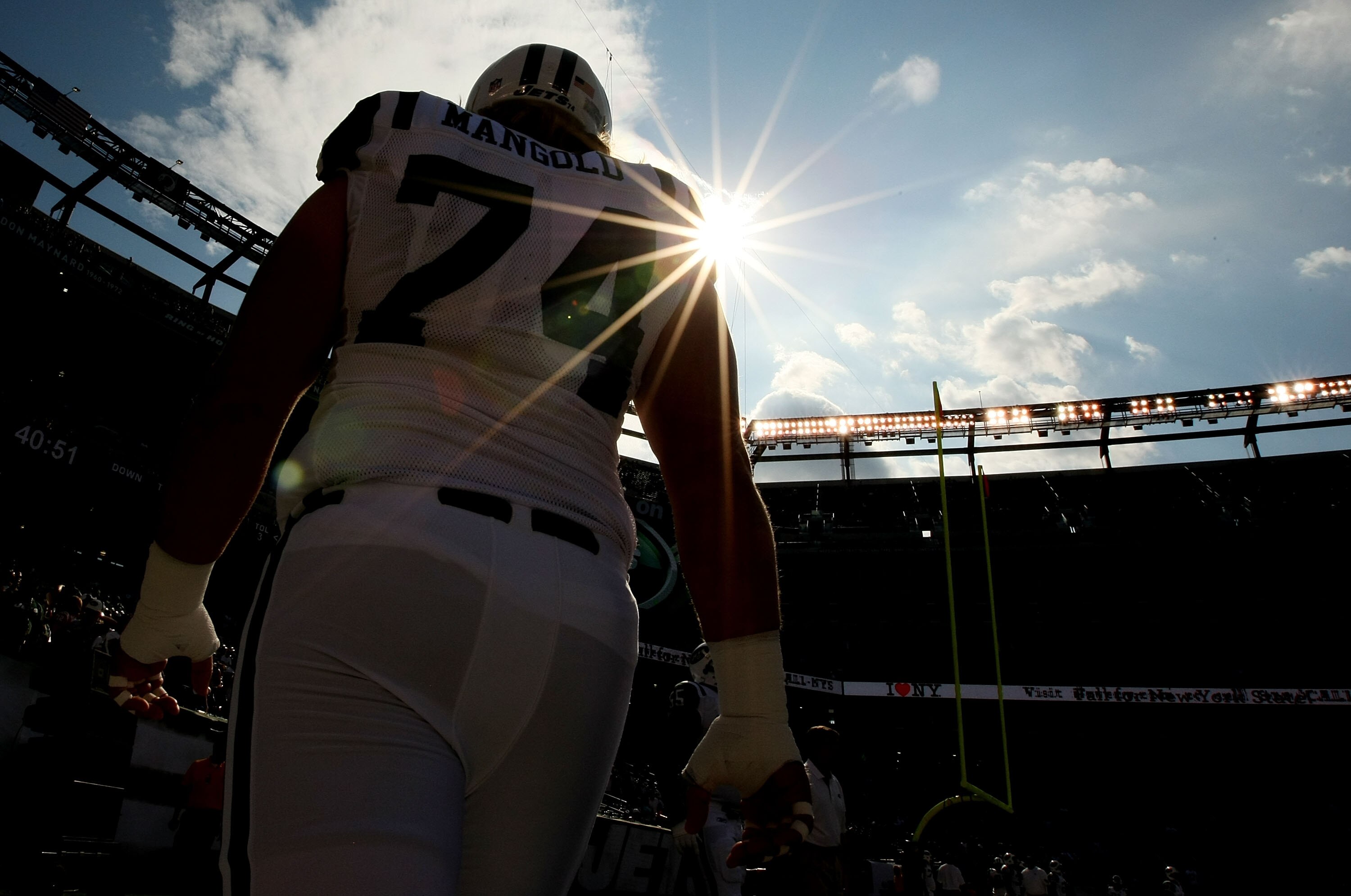 EAST RUTHERFORD, NJ - SEPTEMBER 19:  Nick Mangold #74 of the New York Jets looks on during warmups prior to the game against the New England Patriots on September 19, 2010 at the New Meadowlands Stadium in East Rutherford, New Jersey.  (Photo by Al Bello/
