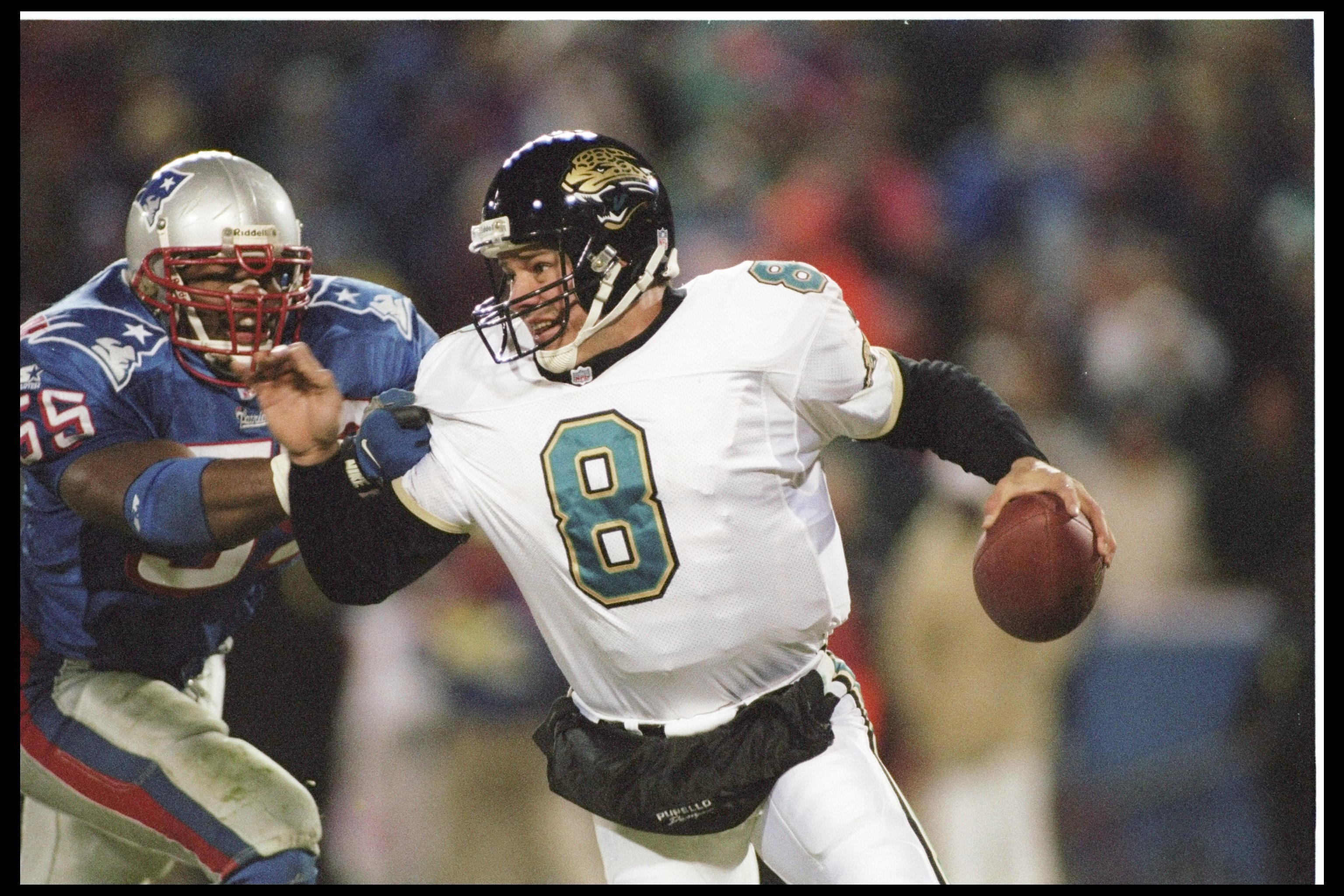 12 Jan 1997:   Defensive back Willie McGinest #55 of the New England Patriots rushes quarterback Mark Brunell #8 of the Jacksonville Jaguars during the AFC Championship game played at the Foxboro Stadium in Foxboro, Massachusetts.  The  Patriots won,  20-