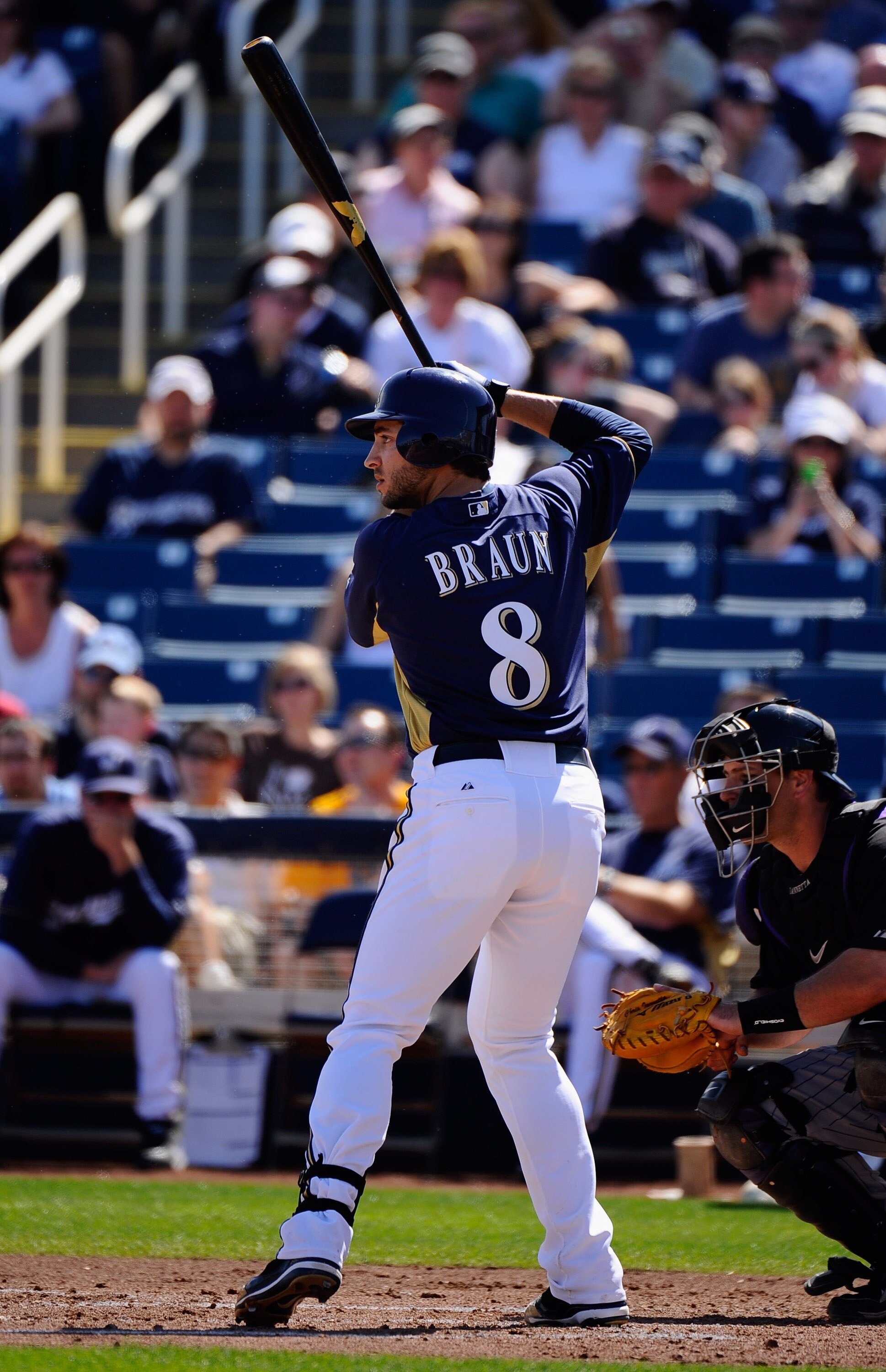 PHOENIX, AZ - MARCH 10:  Ryan Braun #8 of the Milwaukee Brewers swings the bat against the Colorado Rockies during the spring training baseball game at Maryvale Baseball Park on March 10, 2011 in Phoenix, Arizona.  (Photo by Kevork Djansezian/Getty Images