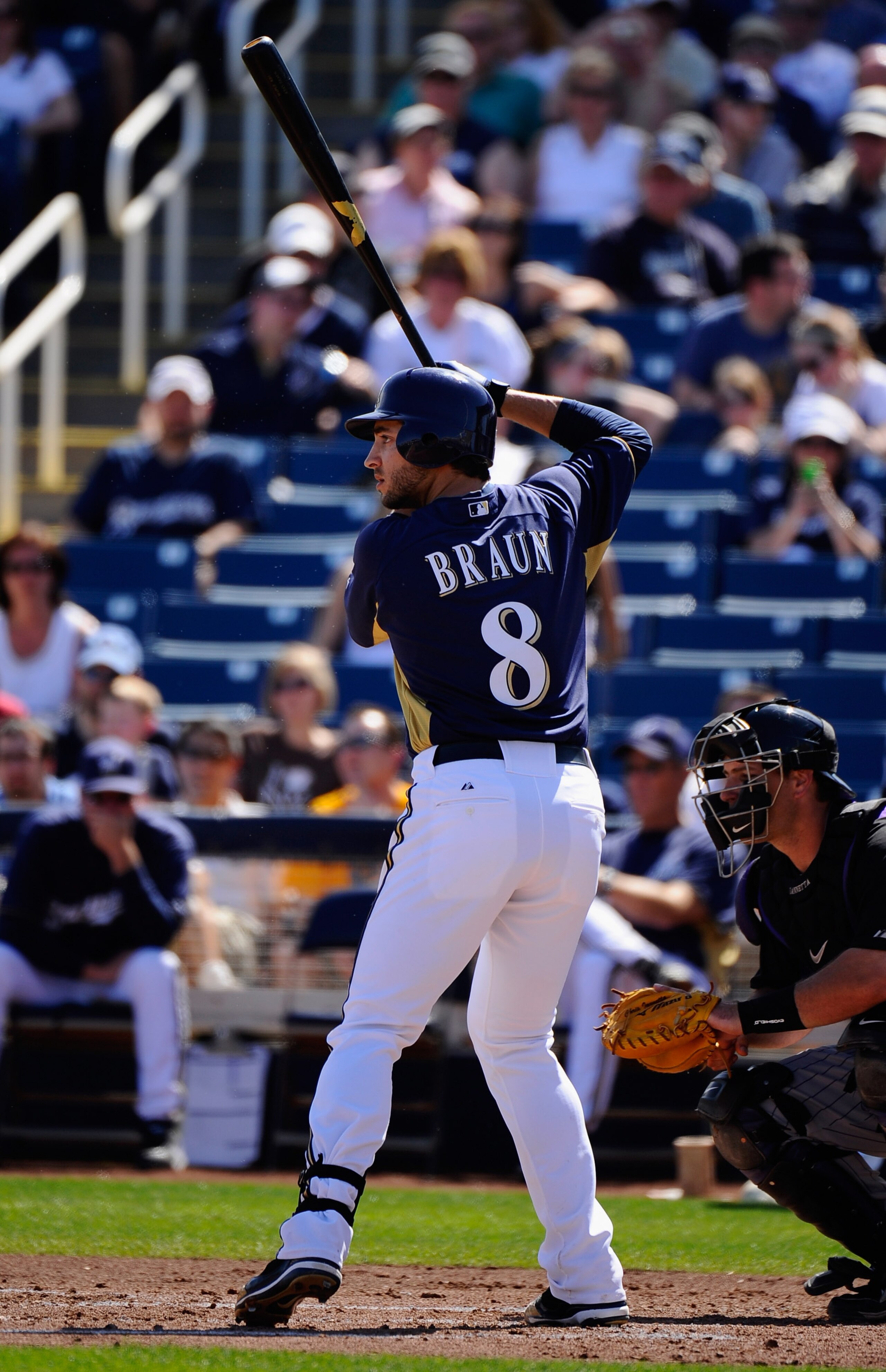 PHOENIX, AZ - MARCH 10:  Ryan Braun #8 of the Milwaukee Brewers swings the bat against the Colorado Rockies during the spring training baseball game at Maryvale Baseball Park on March 10, 2011 in Phoenix, Arizona.  (Photo by Kevork Djansezian/Getty Images