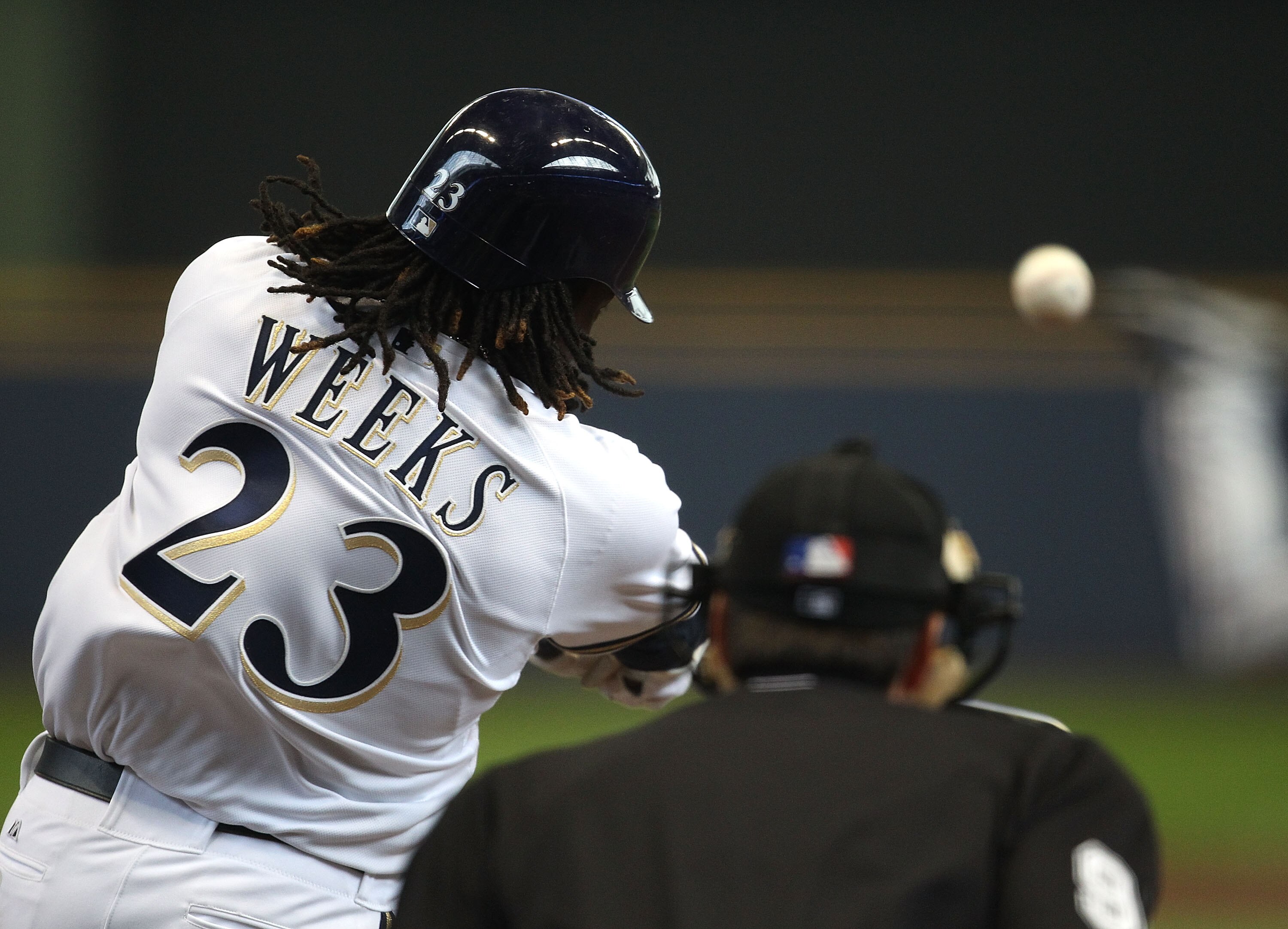 MILWAUKEE, WI - APRIL 04: Rickie Weeks #23 of the Milwaukee Brewers hits a solo home run in the 3rd inning against the Atlanta Braves during the home opener at Miller Park on April 4, 2011 in Milwaukee, Wisconsin. (Photo by Jonathan Daniel/Getty Images)