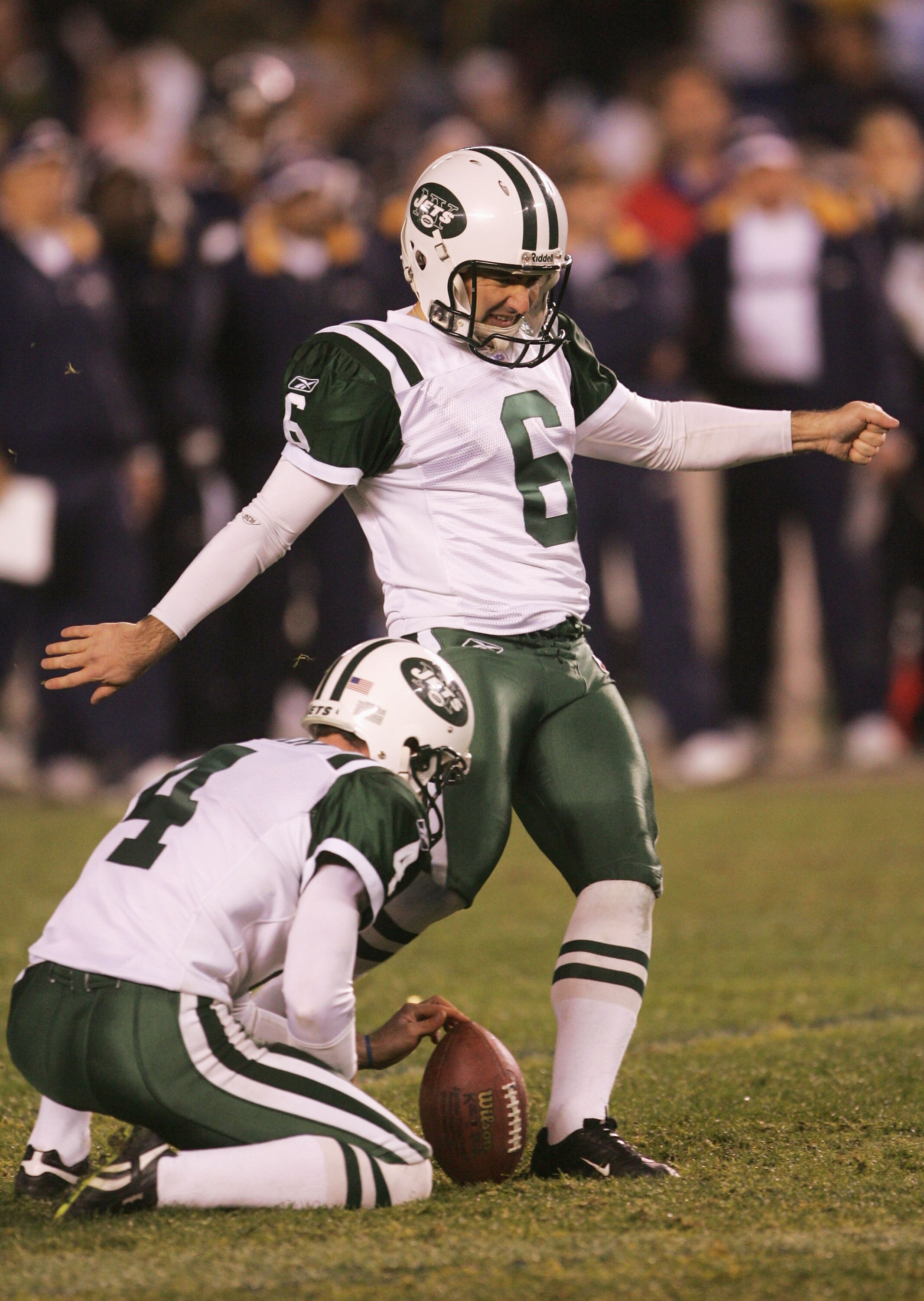 SAN DIEGO - JANUARY 08:  Kicker Doug Brien #6 of the New York Jets kicks the game winning field goal in overtime against the San Diego Chargers during the AFC wild-card game at Qualcomm Stadium on January 8, 2005 in San Diego, California.   The Jets defea