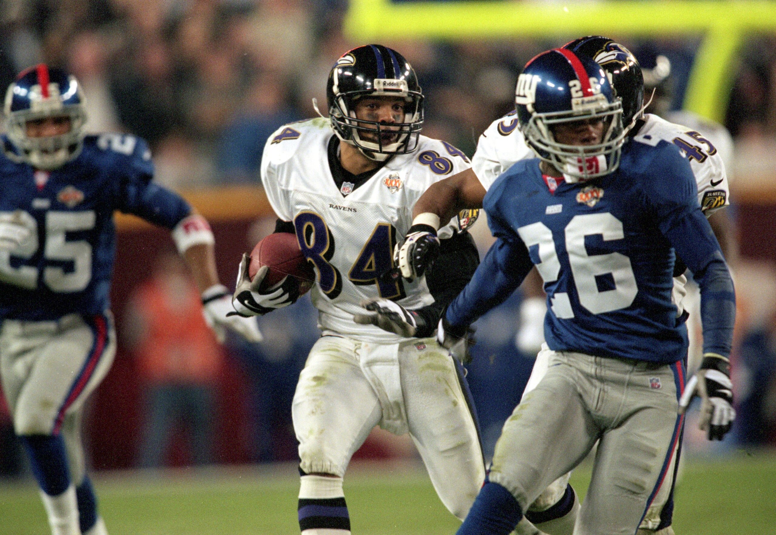 28 Jan 2001: Jermaine Lewis #84 of the Baltimore Ravens runs with the ball for a run back touchdown during the Super Bowl XXXV Game against the New York Giants at the Raymond James Stadium in Tampa, Florida. The Ravens defeated the Giants 34-7. Mandatory 28 Jan 2001: Jermaine Lewis #84 of the Baltimore Ravens runs with the ball for a run back touchdown during the Super Bowl XXXV Game against the New York Giants at the Raymond James Stadium in Tampa, Florida. The Ravens defeated the Giants 34-7. Mandatory
