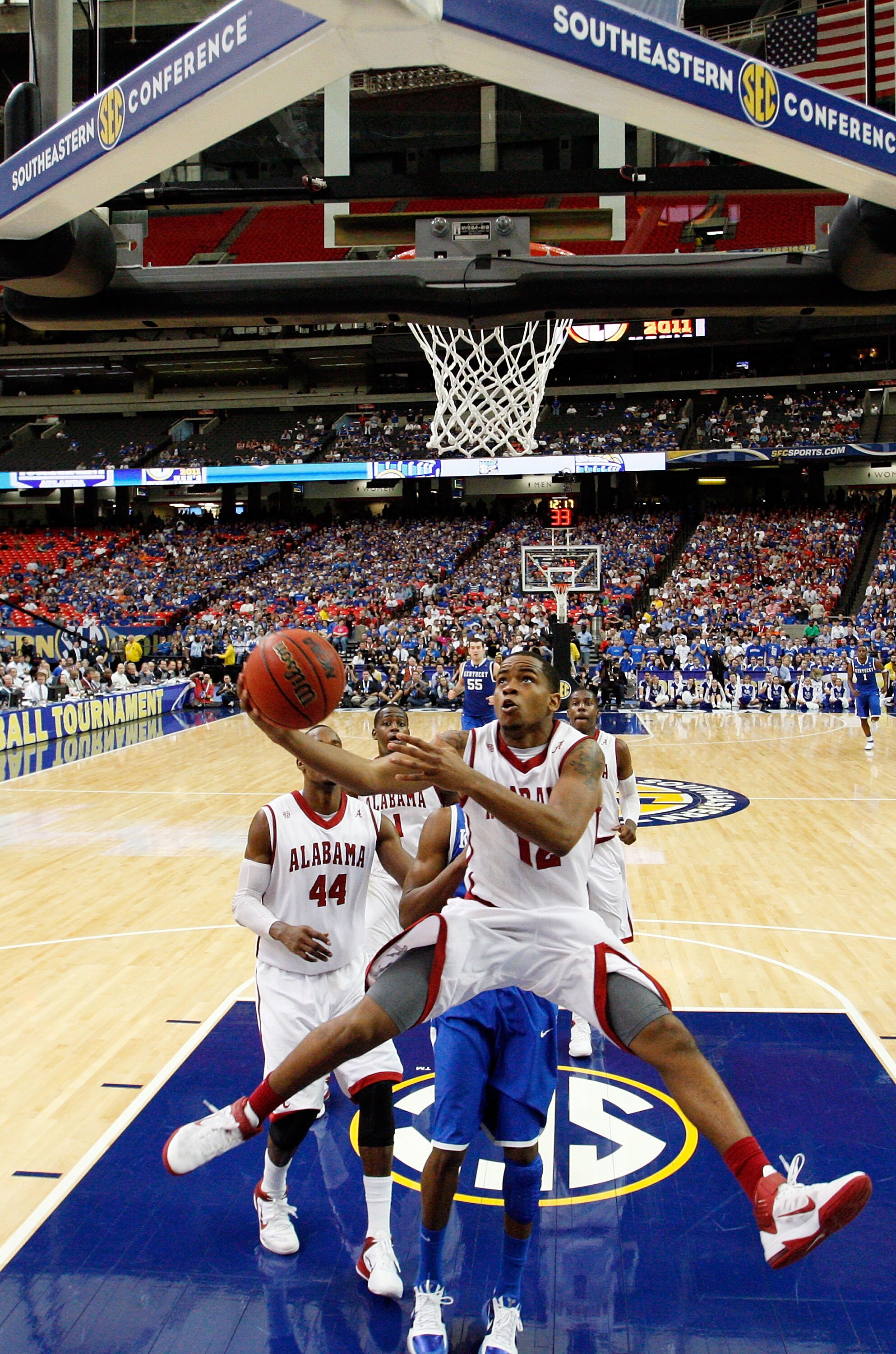 ATLANTA, GA - MARCH 12:  Trevor Releford #12 of the Alabama Crimson Tide shoots against the Kentucky Wildcats during the semifinals of the SEC Men's Basketball Tournament at Georgia Dome on March 12, 2011 in Atlanta, Georgia.  (Photo by Kevin C. Cox/Getty