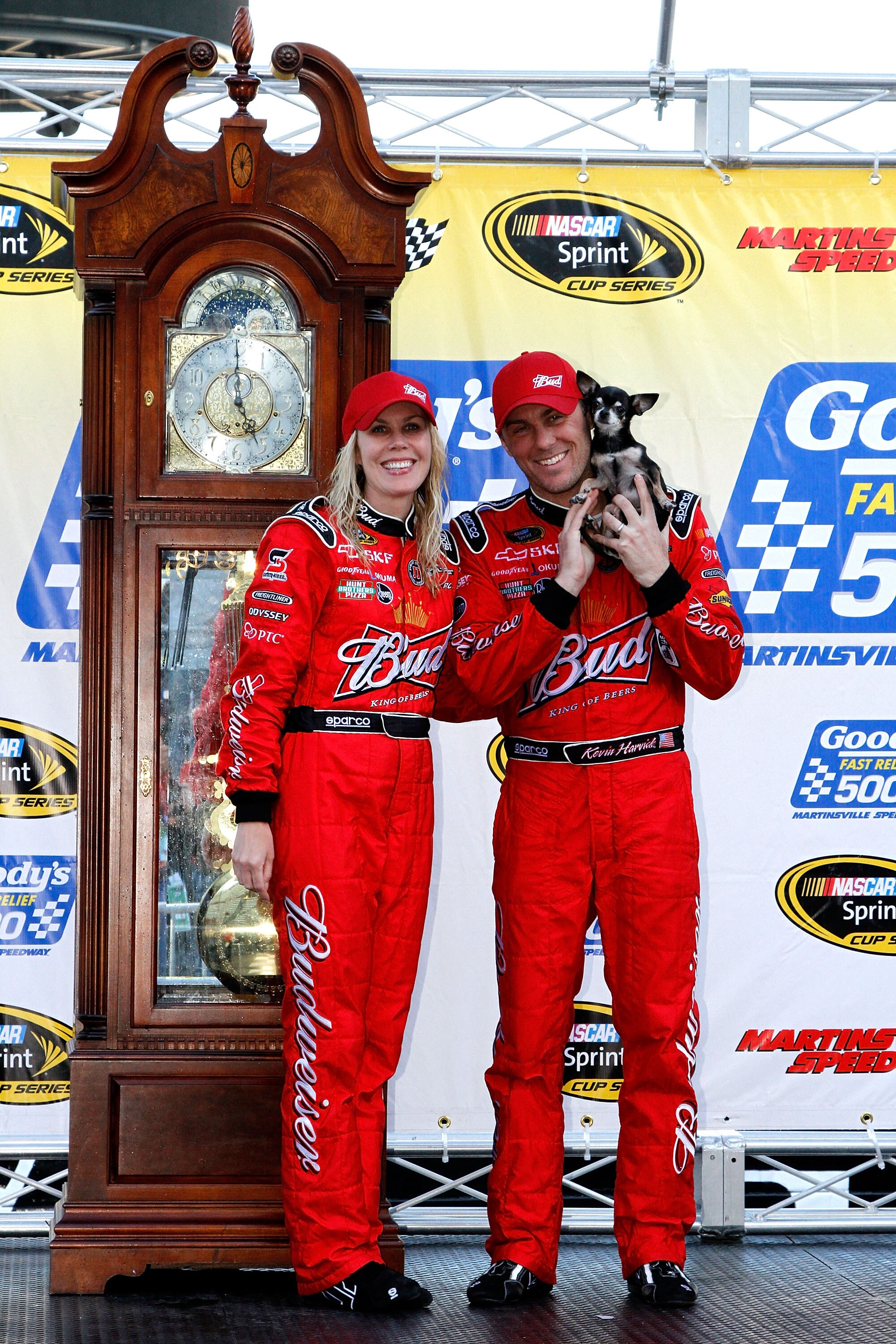 MARTINSVILLE, VA - APRIL 03:  Kevin Harvick (R), driver of the #29 Budweiser Chevrolet, poses with his wife Delana (L)in Victory Lane after winning the NASCAR Sprint Cup Series Goody's Fast Relief 500 at Martinsville Speedway on April 3, 2011 in Martinsvi