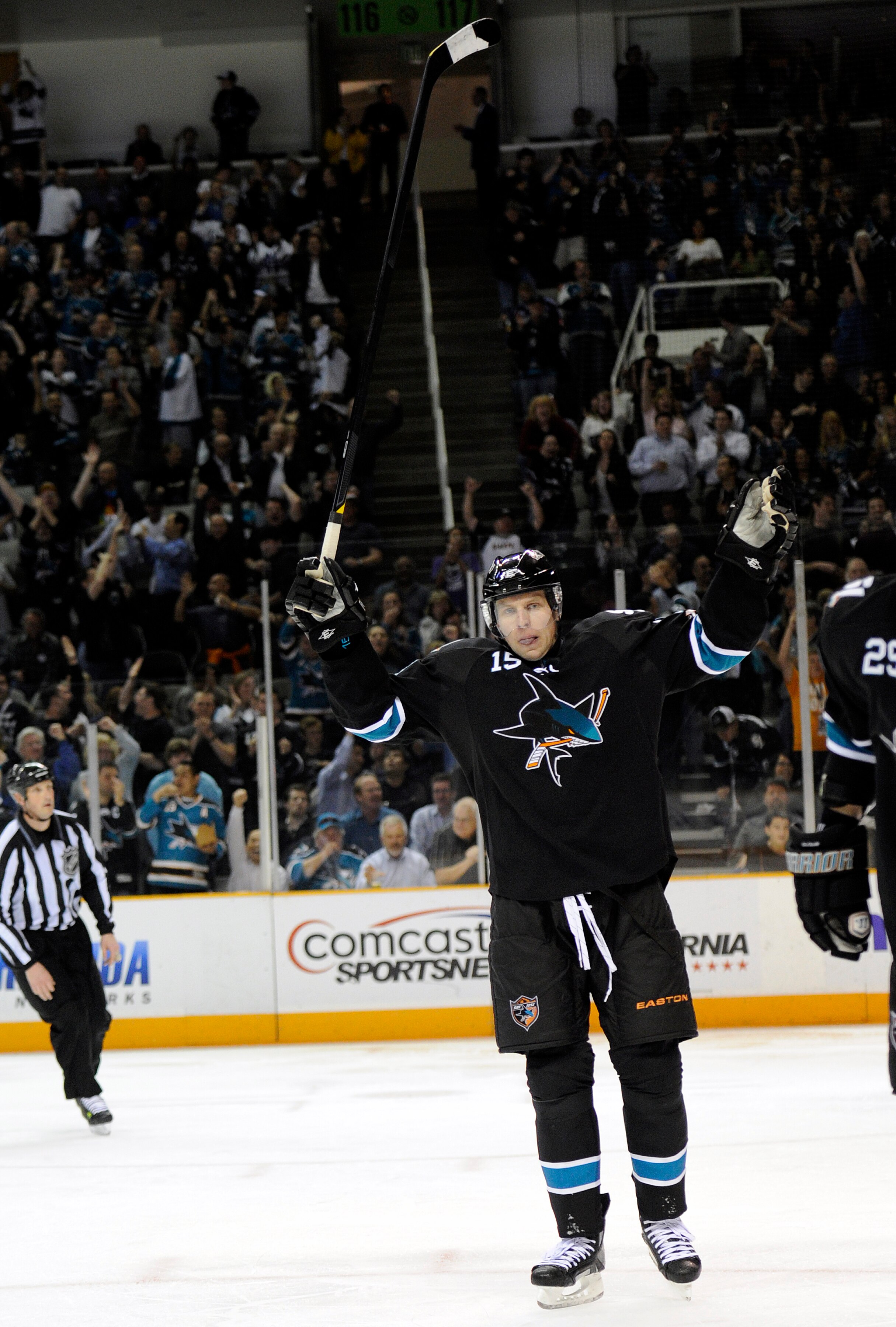 SAN JOSE, CA - MARCH 31: Dany Heatley #15 of the San Jose Sharks celebrates after teammate Logan Couture scores a goal against the Dallas Stars in the second period during an NHL hockey game at the HP Pavilion on March 31, 2011 in San Jose, California. (P