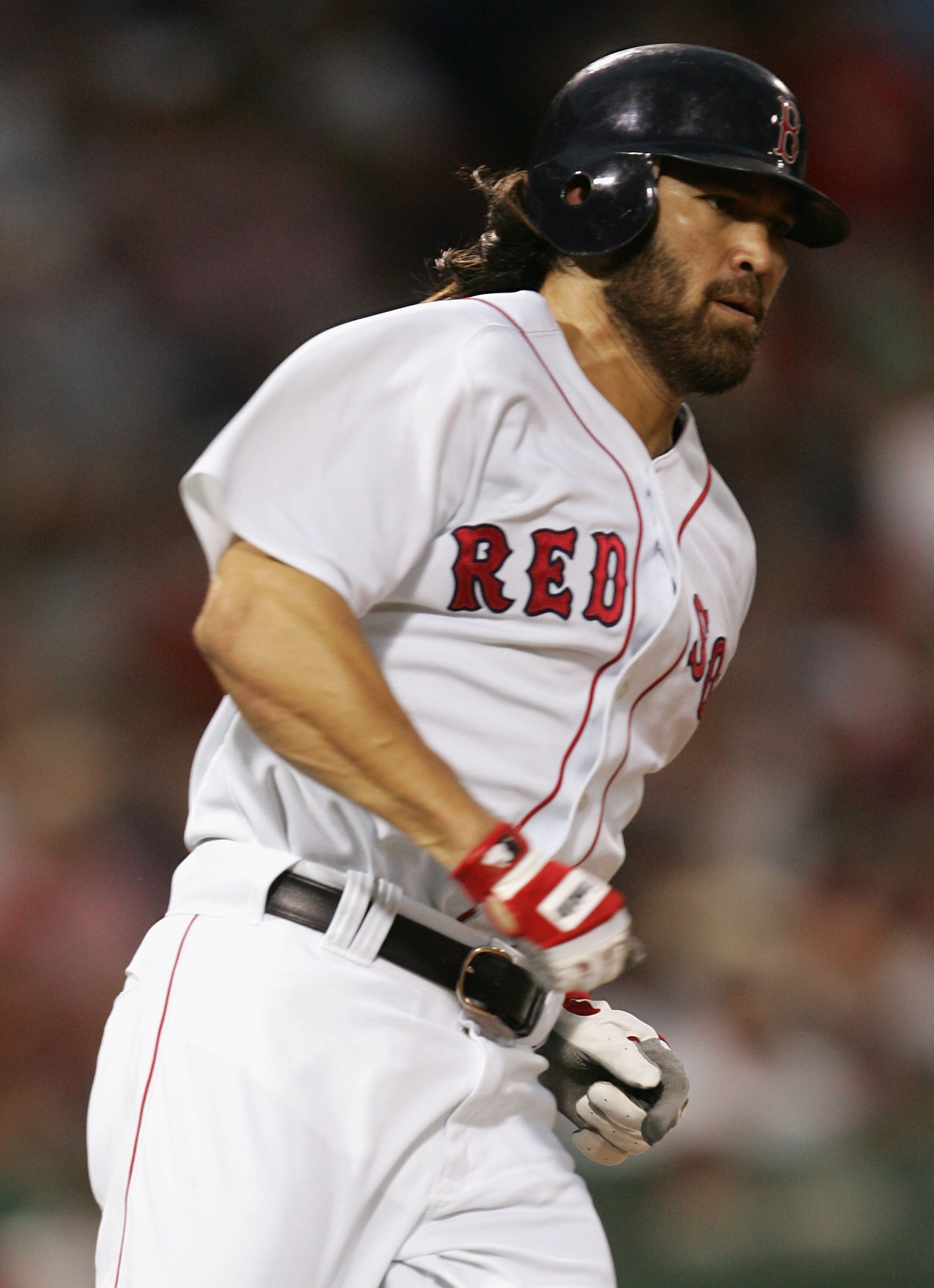 BOSTON - OCTOBER 07:  Outfielder Johnny Damon #18 of the Boston Red Sox runs the bases agaisnt the Chicago White Sox during Game Three of the American League Division Series at Fenway Park on October 7, 2005 in Boston, Massachusetts.  (Photo by Jonathan D