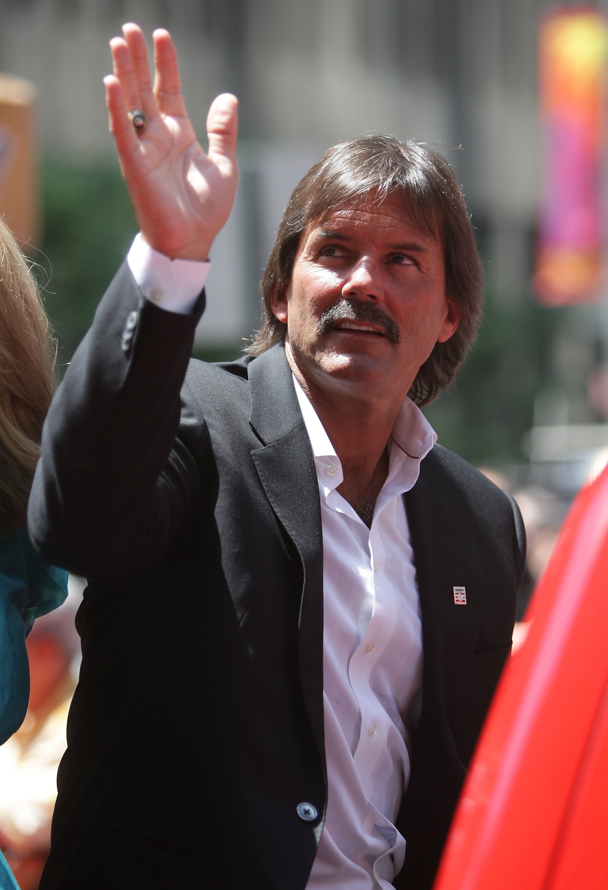 NEW YORK - JULY 15:  Halll of famer Dennis Eckersley waves during the MLB All-Star Game Red Carpet Parade on July 15, 2008 in New York City.  (Photo by Mike Stobe/Getty Images)