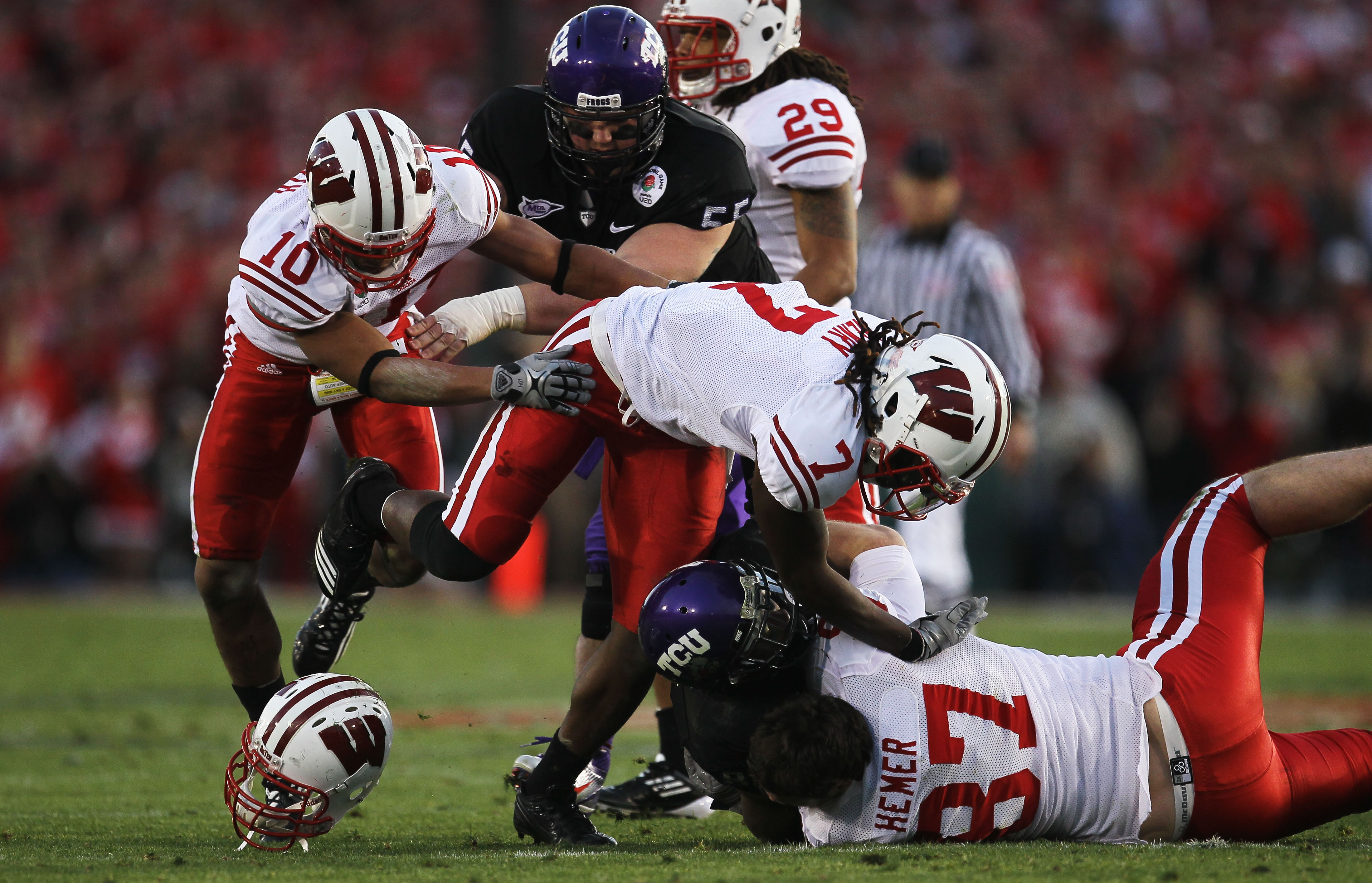 PASADENA, CA - JANUARY 01:  Wide receiver Jeremy Kerley #85 of the TCU Horned Frogs is tackled after a catch against the Wisconsin Badgers in the 97th Rose Bowl game on January 1, 2011 in Pasadena, California.  (Photo by Stephen Dunn/Getty Images)