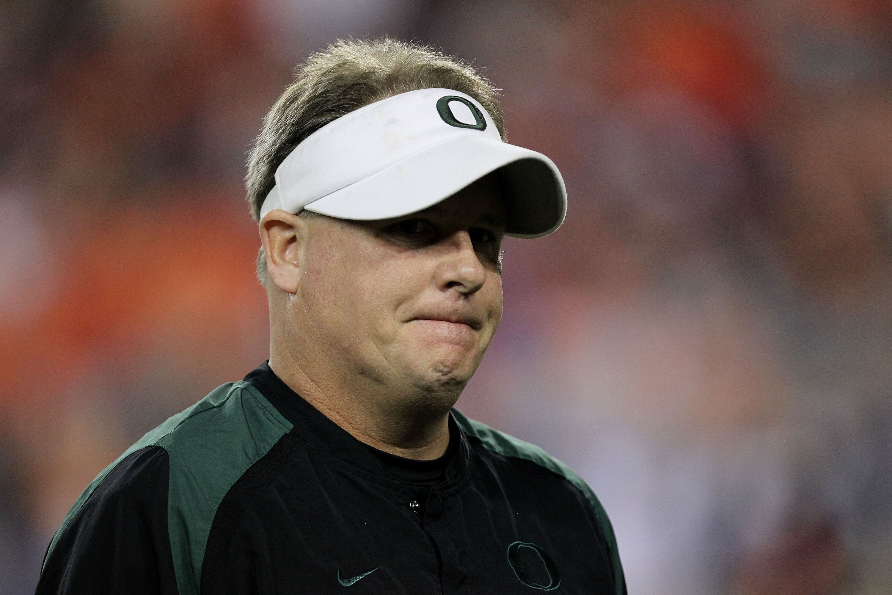 GLENDALE, AZ - JANUARY 10:  Head coach Chip Kelly of the Oregon Ducks looks on during their 22-19 loss to the Auburn Tigers during the Tostitos BCS National Championship Game at University of Phoenix Stadium on January 10, 2011 in Glendale, Arizona.  (Pho