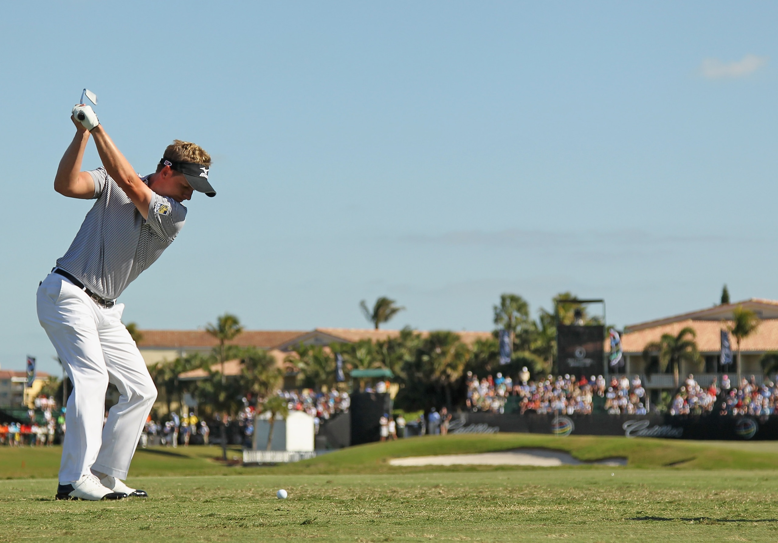 DORAL, FL - MARCH 13: Luke Donald of England hits his tee shot on the ninth hole during the final round of the 2011 WGC- Cadillac Championship at the TPC Blue Monster at the Doral Golf Resort and Spa on March 13, 2011 in Doral, Florida. (Photo by Mike E DORAL, FL - MARCH 13: Luke Donald of England hits his tee shot on the ninth hole during the final round of the 2011 WGC- Cadillac Championship at the TPC Blue Monster at the Doral Golf Resort and Spa on March 13, 2011 in Doral, Florida. (Photo by Mike E