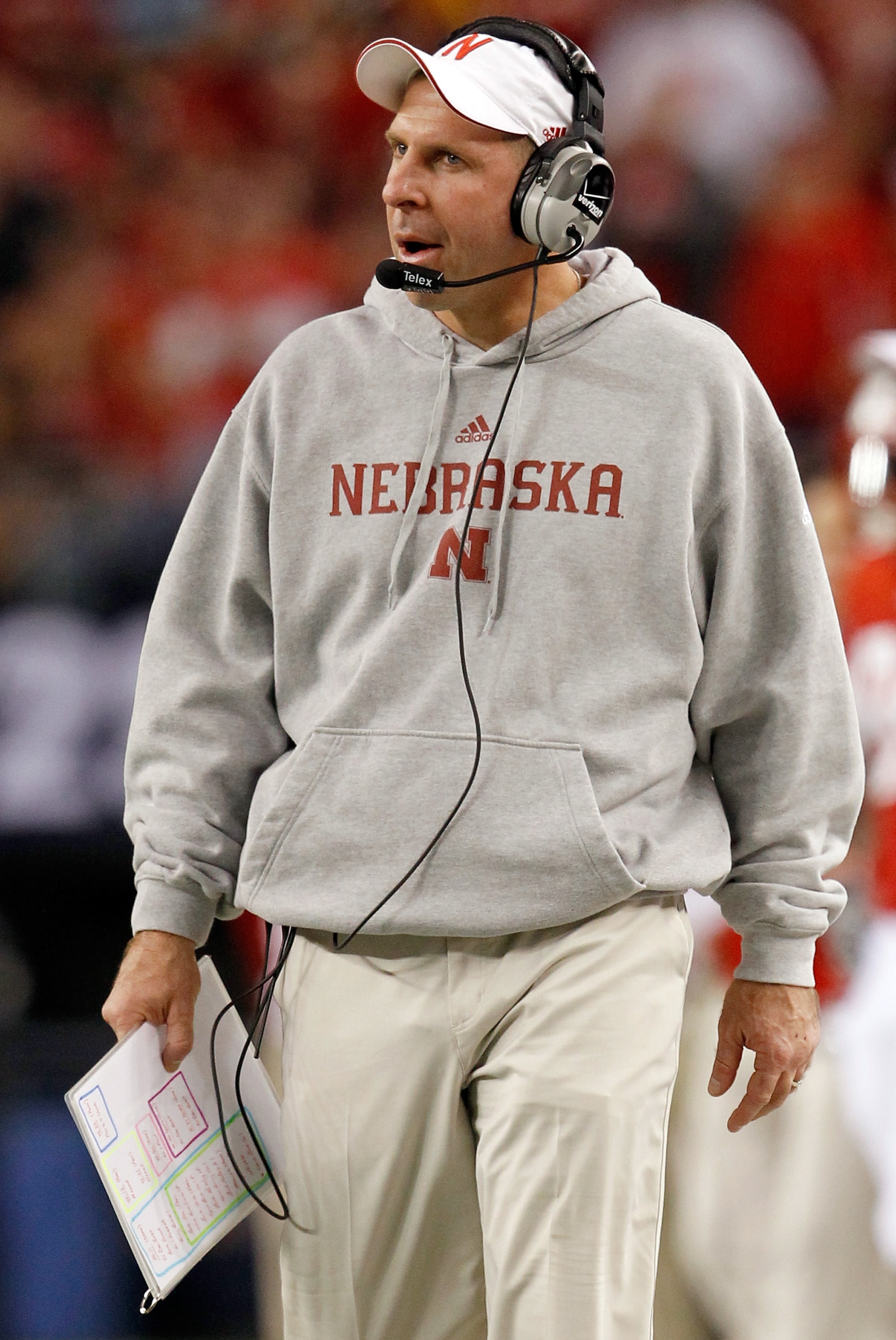 ARLINGTON, TX - DECEMBER 04:  Head coach Bo Pelini of the Nebraska Cornhuskers leads his team against the Oklahoma Sooners at Cowboys Stadium on December 4, 2010 in Arlington, Texas. The Sooners beat the Cornhuskers 23-20.  (Photo by Tom Pennington/Getty
