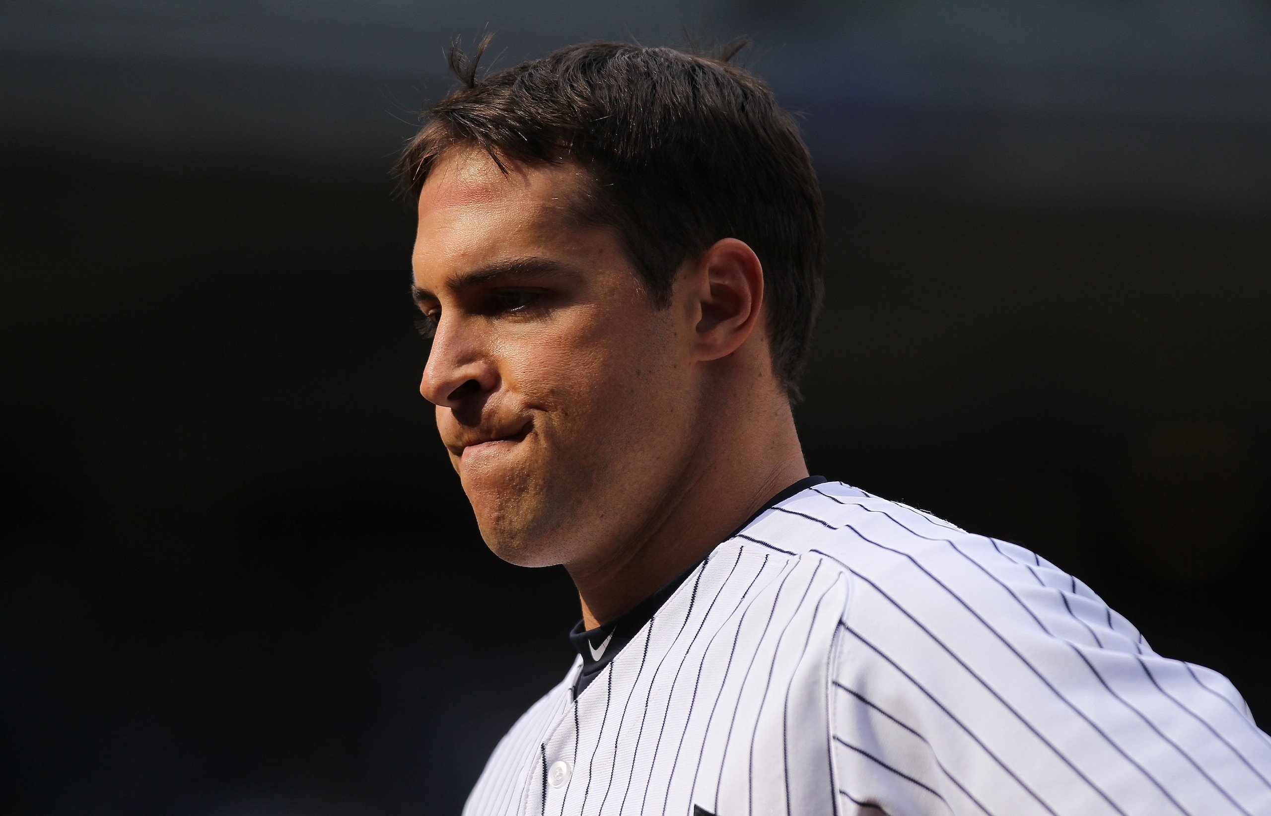 NEW YORK, NY - APRIL 03:  Mark Teixeira #25 of the New York Yankees reacts after a fly out against the Detroit Tigers at Yankee Stadium on April 3, 2011 in the Bronx borough of New York City.  (Photo by Nick Laham/Getty Images)