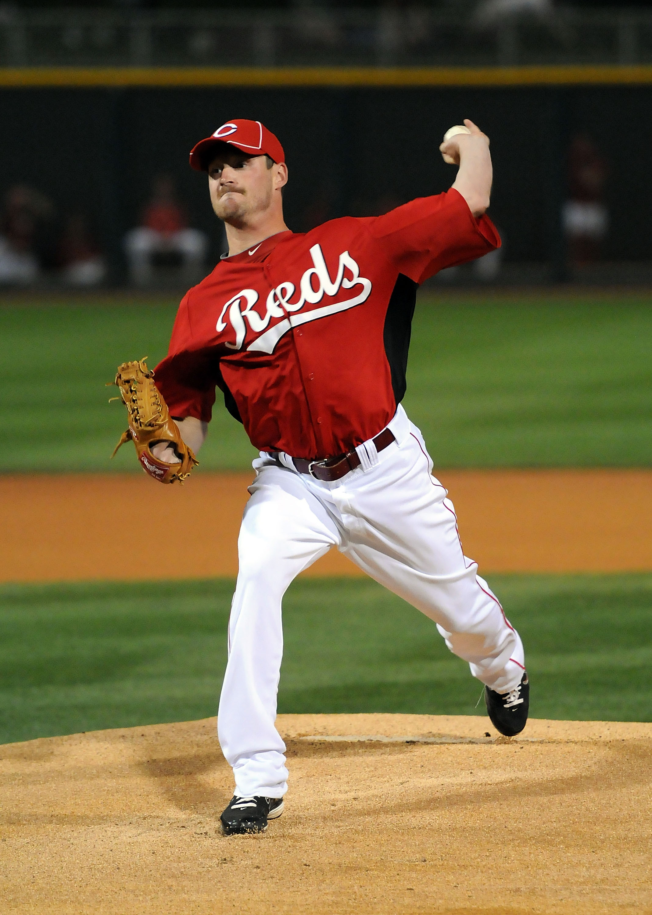 GOODYEAR, AZ - MARCH 03:  Travis Wood #30 of the Cincinnati Reds delivers a pitch against the Los Angeles Dodgers at Goodyear Ballpark on March 3, 2011 in Goodyear, Arizona.  (Photo by Norm Hall/Getty Images)