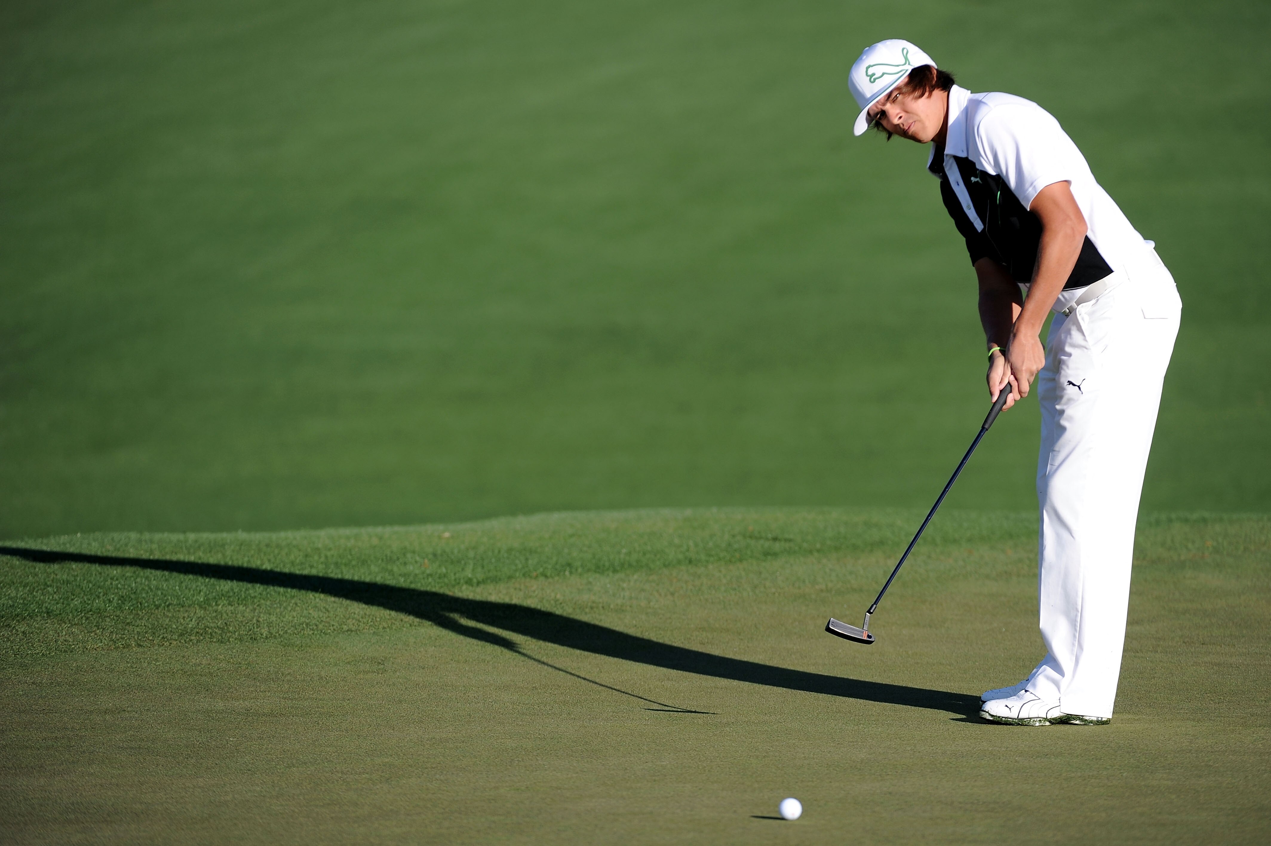 AUGUSTA, GA - APRIL 04:  Rickie Fowler watches a putt during a practice round prior to the 2011 Masters Tournament at Augusta National Golf Club on April 4, 2011 in Augusta, Georgia.  (Photo by Harry How/Getty Images)