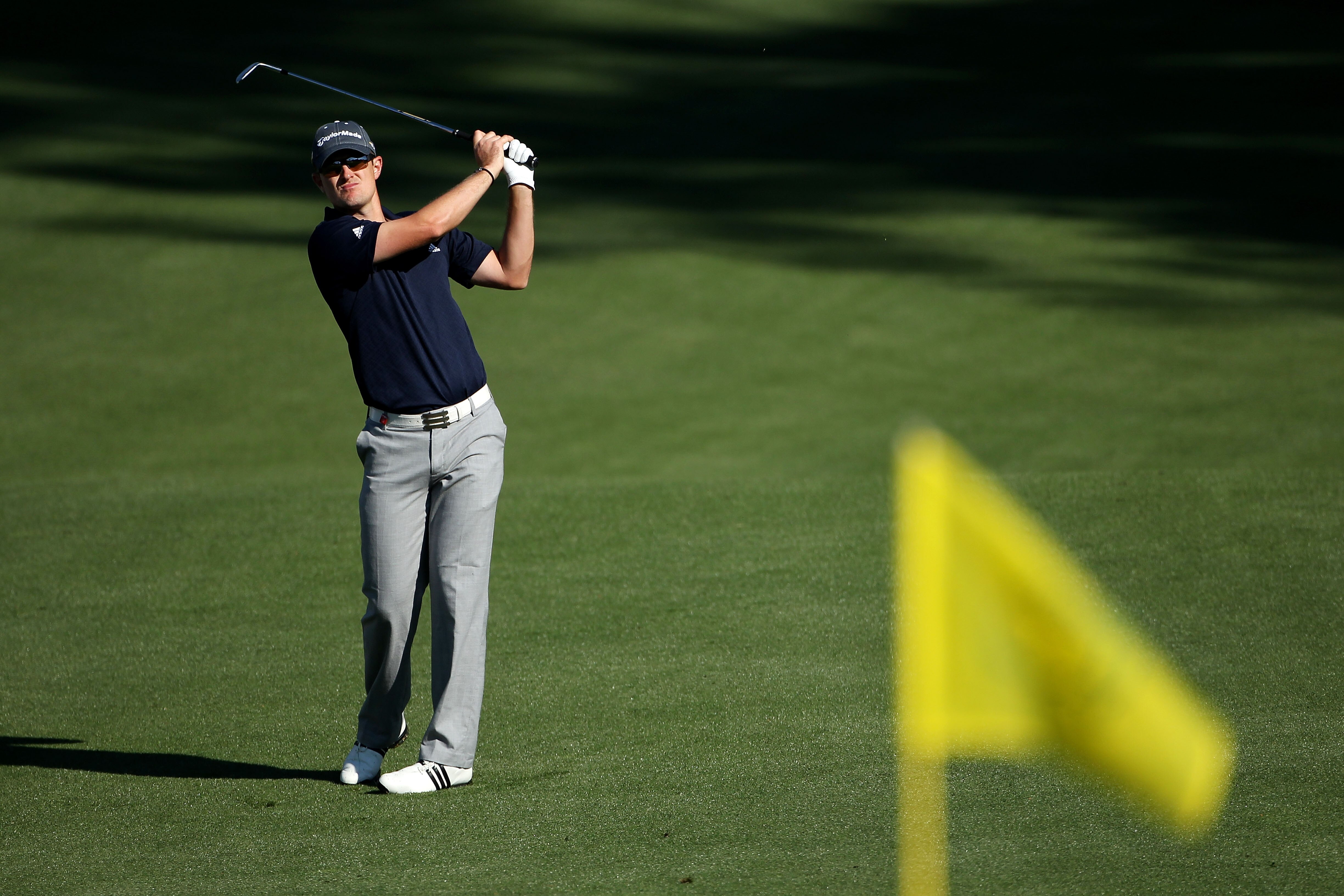 AUGUSTA, GA - APRIL 04:  Justin Rose of England hits a shot during a practice round prior to the 2011 Masters Tournament at Augusta National Golf Club on April 4, 2011 in Augusta, Georgia.  (Photo by Andrew Redington/Getty Images)