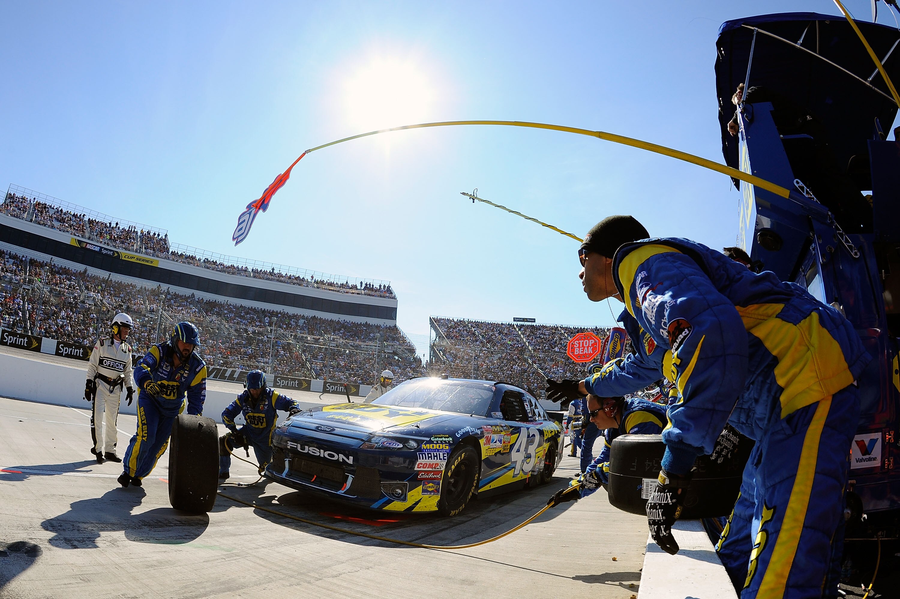 MARTINSVILLE, VA - APRIL 03:  A.J. Allmendinger, driver of the #43 Best Buy Ford, pits during the NASCAR Sprint Cup Series Goody's Fast Relief 500 at Martinsville Speedway on April 3, 2011 in Martinsville, Virginia.  (Photo by Jared C. Tilton/Getty Images