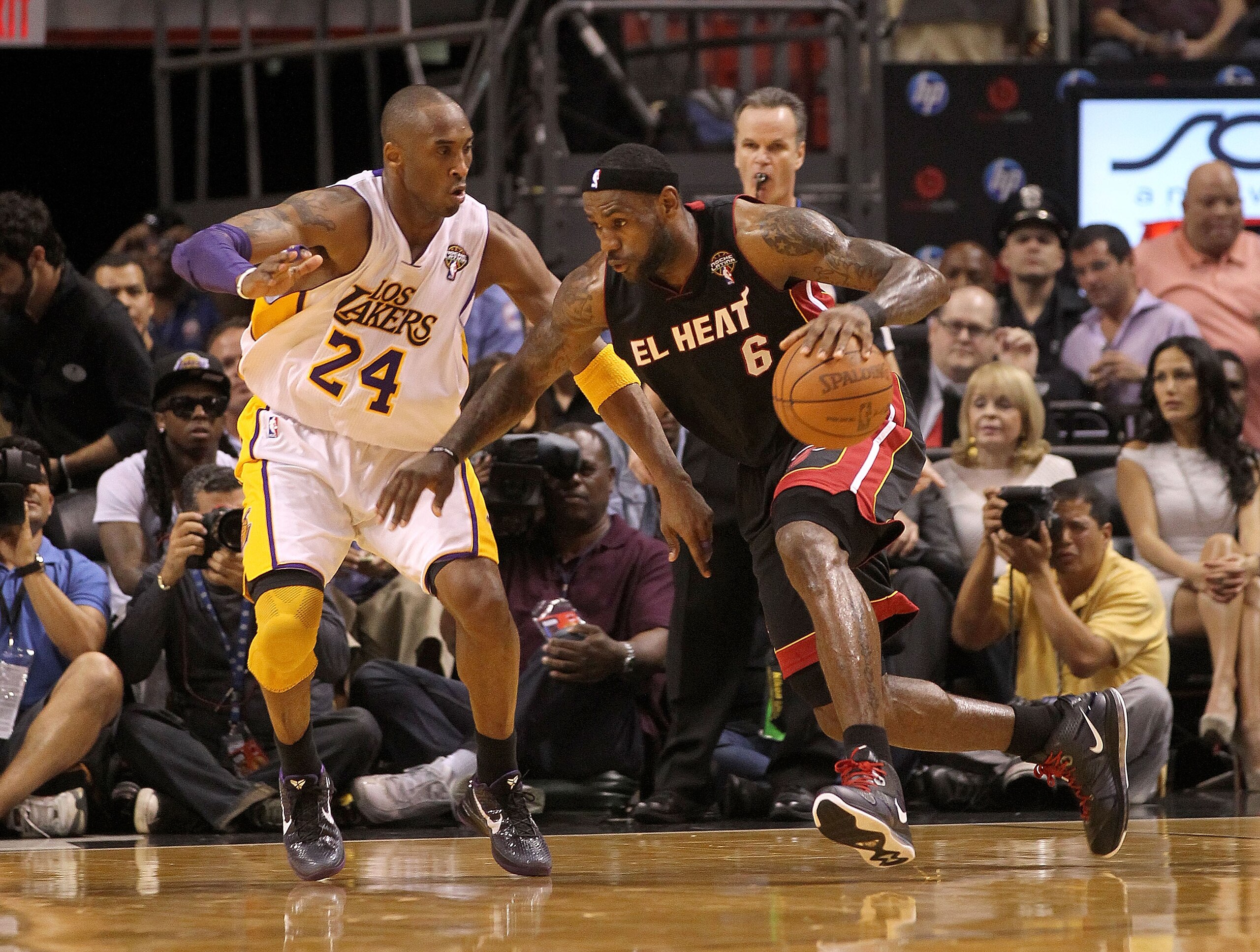 MIAMI, FL - MARCH 10: LeBron James #6 of the Miami Heat posts up Kobe Bryant #24 of the Los Angeles Lakers during a game at American Airlines Arena on March 10, 2011 in Miami, Florida. NOTE TO USER: User expressly acknowledges and agrees that, by downl MIAMI, FL - MARCH 10: LeBron James #6 of the Miami Heat posts up Kobe Bryant #24 of the Los Angeles Lakers during a game at American Airlines Arena on March 10, 2011 in Miami, Florida. NOTE TO USER: User expressly acknowledges and agrees that, by downl