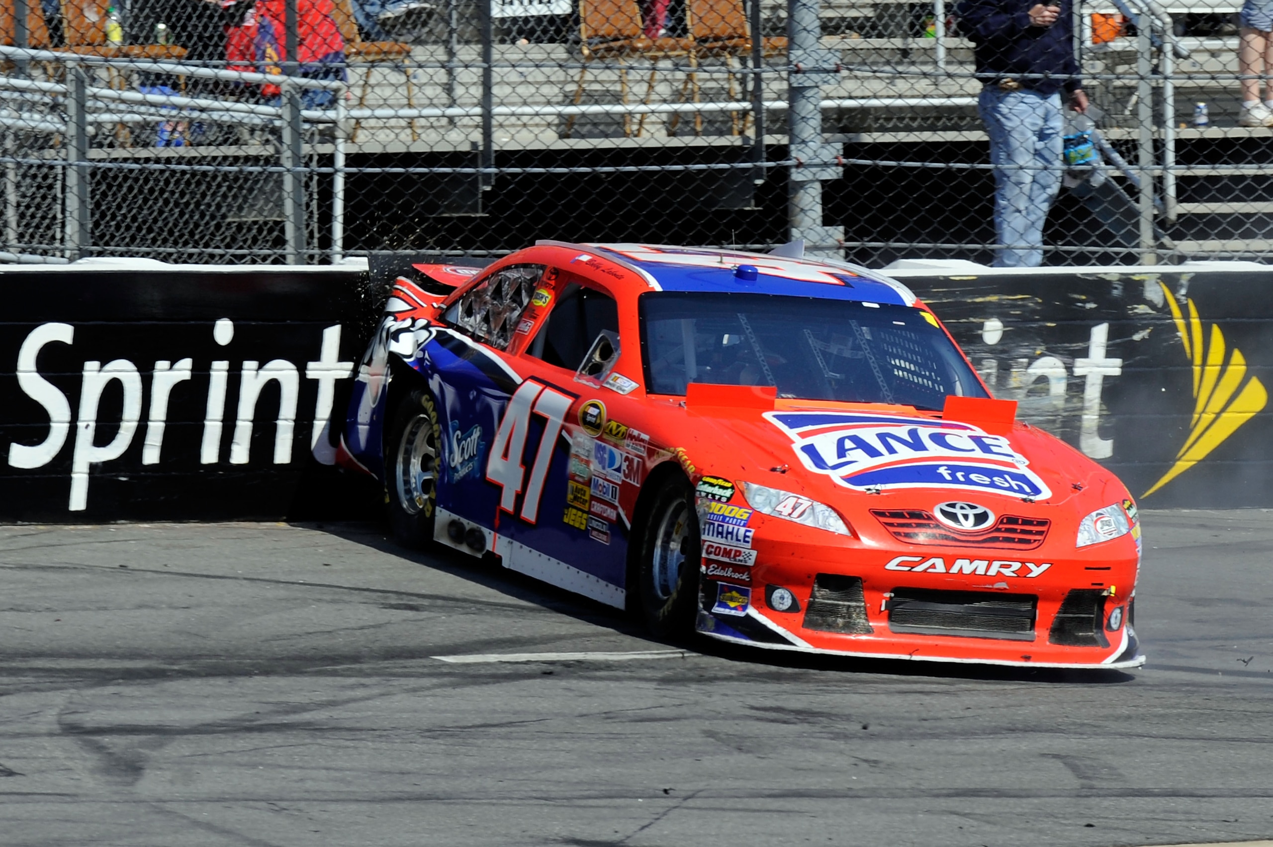MARTINSVILLE, VA - APRIL 03:   Bobby Labonte, driver of the #47 Lance Snacks Toyota, spins out after a multi-car incident during the NASCAR Sprint Cup Series Goody's Fast Relief 500 at Martinsville Speedway on April 3, 2011 in Martinsville, Virginia.  (Ph