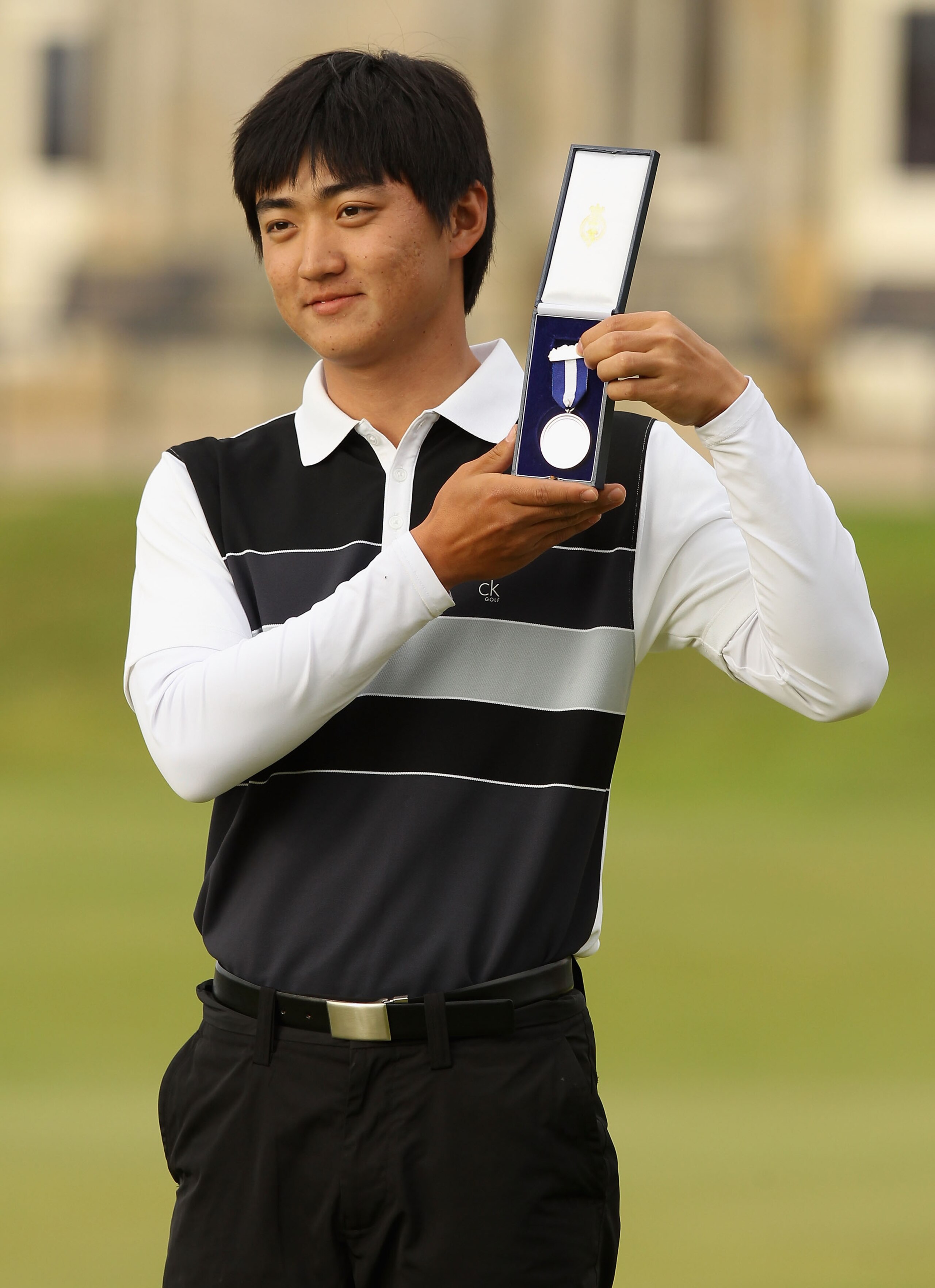 ST ANDREWS, SCOTLAND - JULY 18: Amateur Jin Jeong of South Korea poses with the silver medal for the highest placed amateur after the final round of the 139th Open Championship on the Old Course, St Andrews on July 18, 2010 in St Andrews, Scotland. (Pho ST ANDREWS, SCOTLAND - JULY 18: Amateur Jin Jeong of South Korea poses with the silver medal for the highest placed amateur after the final round of the 139th Open Championship on the Old Course, St Andrews on July 18, 2010 in St Andrews, Scotland. (Pho