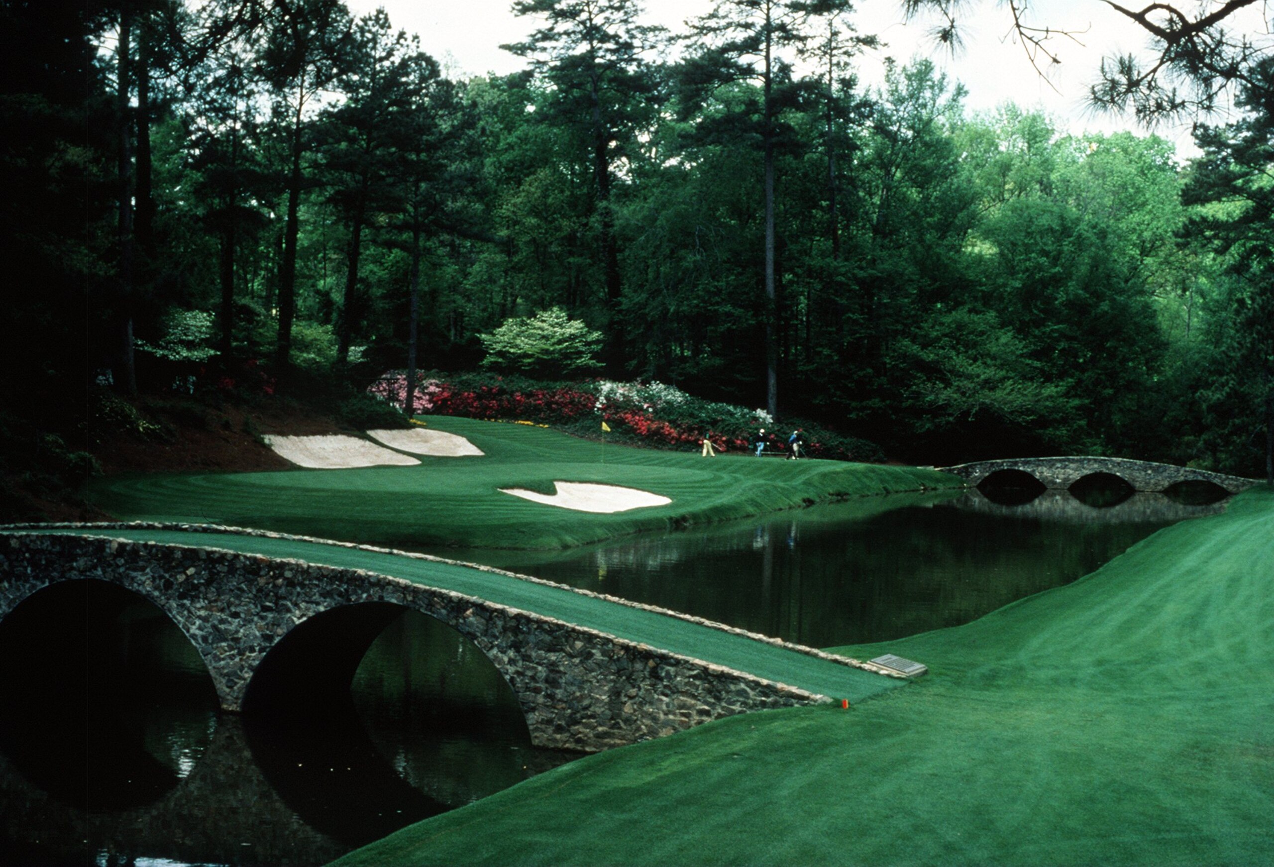 A SCENIC VIEW OF THE INFAMOUS AMEN CORNER OF THE PAR 3 12TH HOLE DURING THE 1992 MASTERS TOURNAMENT AT THE AUGUSTA NATIONAL GOLF COURSE IN AUGUSTA, GEORGIA. A SCENIC VIEW OF THE INFAMOUS AMEN CORNER OF THE PAR 3 12TH HOLE DURING THE 1992 MASTERS TOURNAMENT AT THE AUGUSTA NATIONAL GOLF COURSE IN AUGUSTA, GEORGIA.