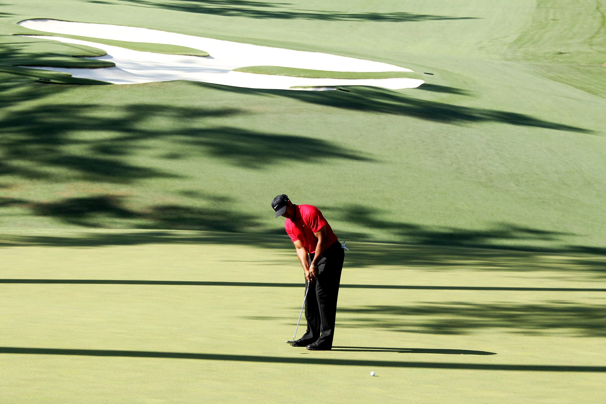 AUGUSTA, GA - APRIL 11: Tiger Woods putts on the tenth green during the final round of the 2010 Masters Tournament at Augusta National Golf Club on April 11, 2010 in Augusta, Georgia. (Photo by David Cannon/Getty Images) AUGUSTA, GA - APRIL 11: Tiger Woods putts on the tenth green during the final round of the 2010 Masters Tournament at Augusta National Golf Club on April 11, 2010 in Augusta, Georgia. (Photo by David Cannon/Getty Images)