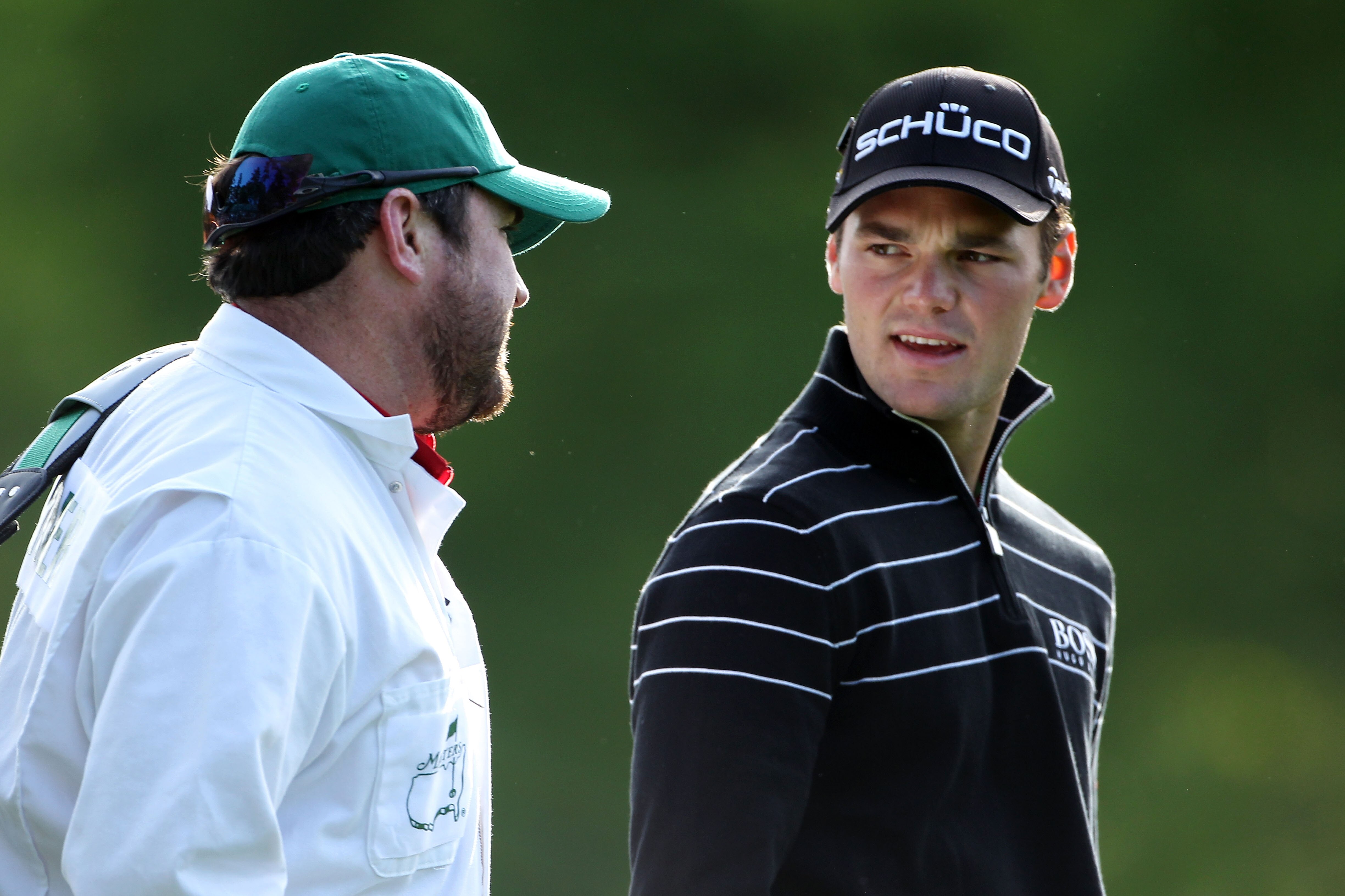AUGUSTA, GA - APRIL 05:  Martin Kaymer of Germany speaks with his caddie Craig Connelly during a practice round prior to the 2011 Masters Tournament at Augusta National Golf Club on April 5, 2011 in Augusta, Georgia.  (Photo by Andrew Redington/Getty Imag