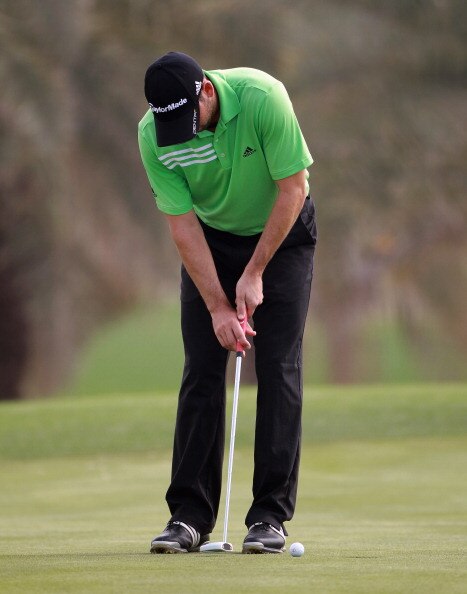 BAHRAIN, BAHRAIN - JANUARY 27:  Sergio Garcia of Spain employs a new putting grip during the first round of the Volvo Golf Champions at The Royal Golf Club on January 27, 2011 in Bahrain, Bahrain.  (Photo by Andrew Redington/Getty Images)