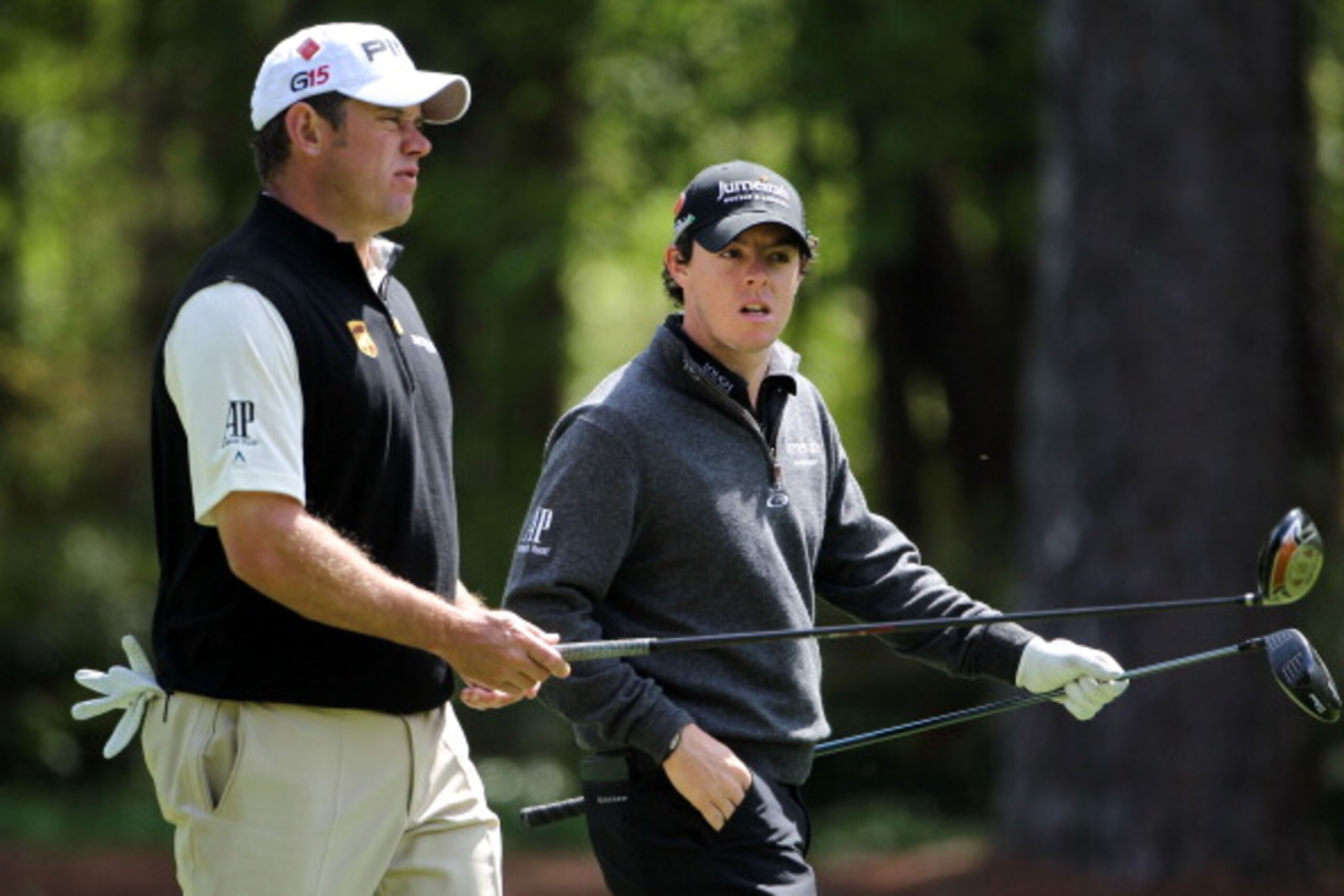 AUGUSTA, GA - APRIL 05:  Lee Westwood of England (L) walks alongside Rory McIlroy of Northern Ireland down a fairway during a practice round prior to the 2011 Masters Tournament at Augusta National Golf Club on April 5, 2011 in Augusta, Georgia.  (Photo b