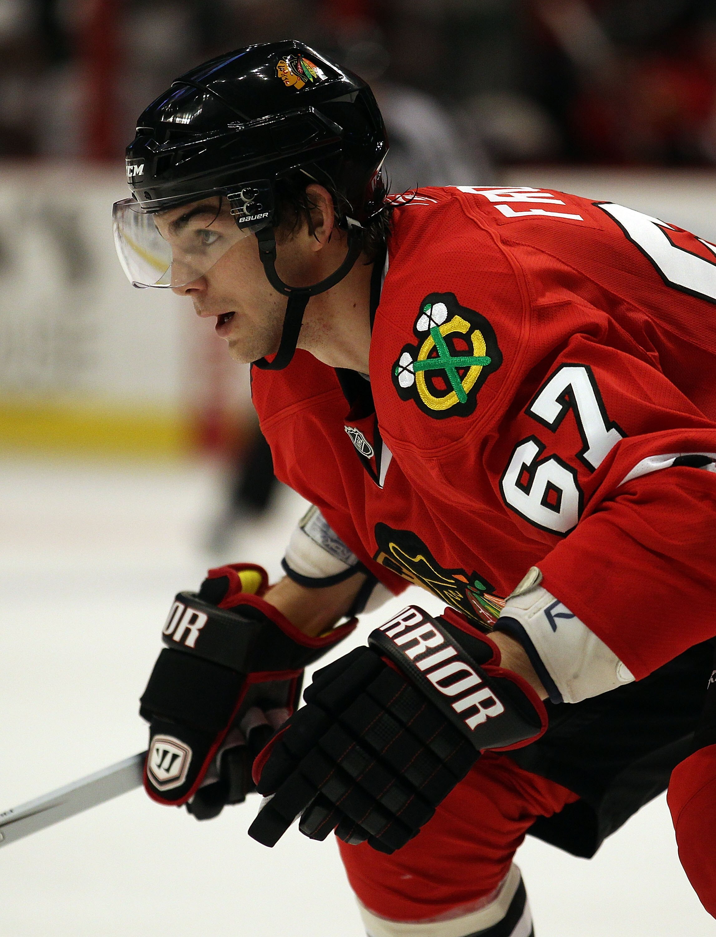 CHICAGO, IL - FEBRUARY 16: Michael Frolik #67 of the Chicago Blackhawks awaits a face-off against the Minnesota Wild at the United Center on February 16, 2011 in Chicago, Illinois. The Blackhawks defeated the Wild 3-1. (Photo by Jonathan Daniel/Getty Imag