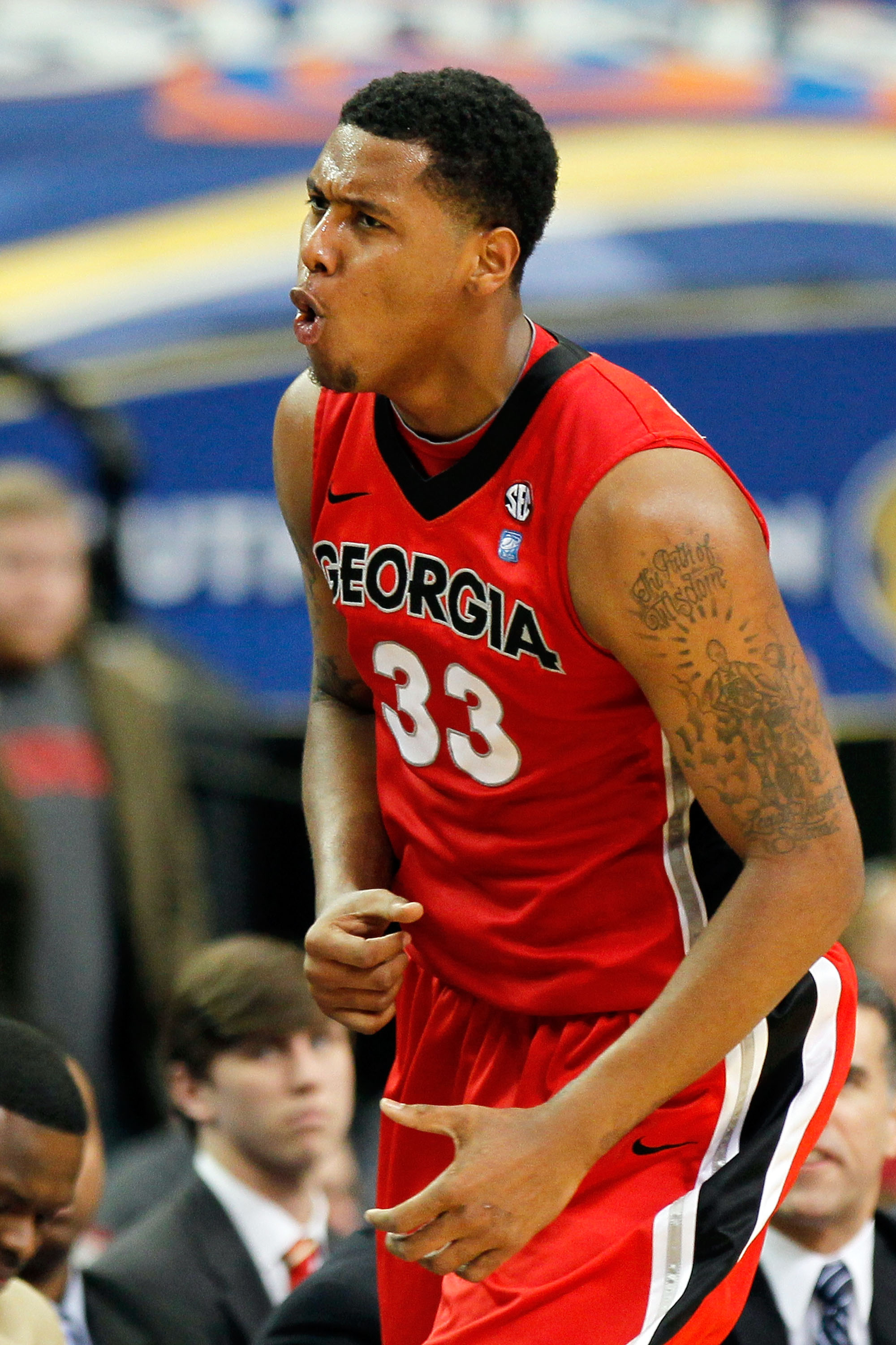 ATLANTA, GA - MARCH 11:  Trey Thompkins #33 of the Georgia Bulldogs celebrates after hitting a 3 point shot against the Alabama Crimson Tide during the quarterfinals of the SEC Men's Basketball Tournament at Georgia Dome on March 11, 2011 in Atlanta, Geor