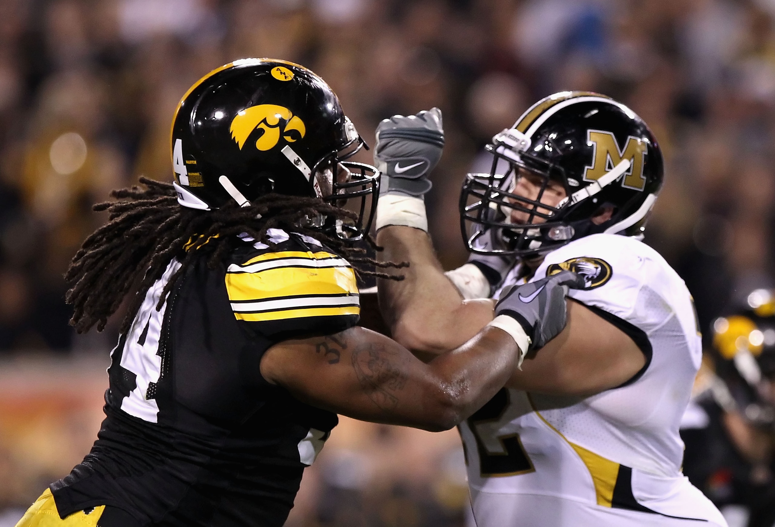 TEMPE, AZ - DECEMBER 28:  Defensive end Adrian Clayborn #94 of the Iowa Hawkeyes in action during the Insight Bowl against the Missouri Tigers at Sun Devil Stadium on December 28, 2010 in Tempe, Arizona. The Hawkeyes defeated the Tigers 27-24.  (Photo by 